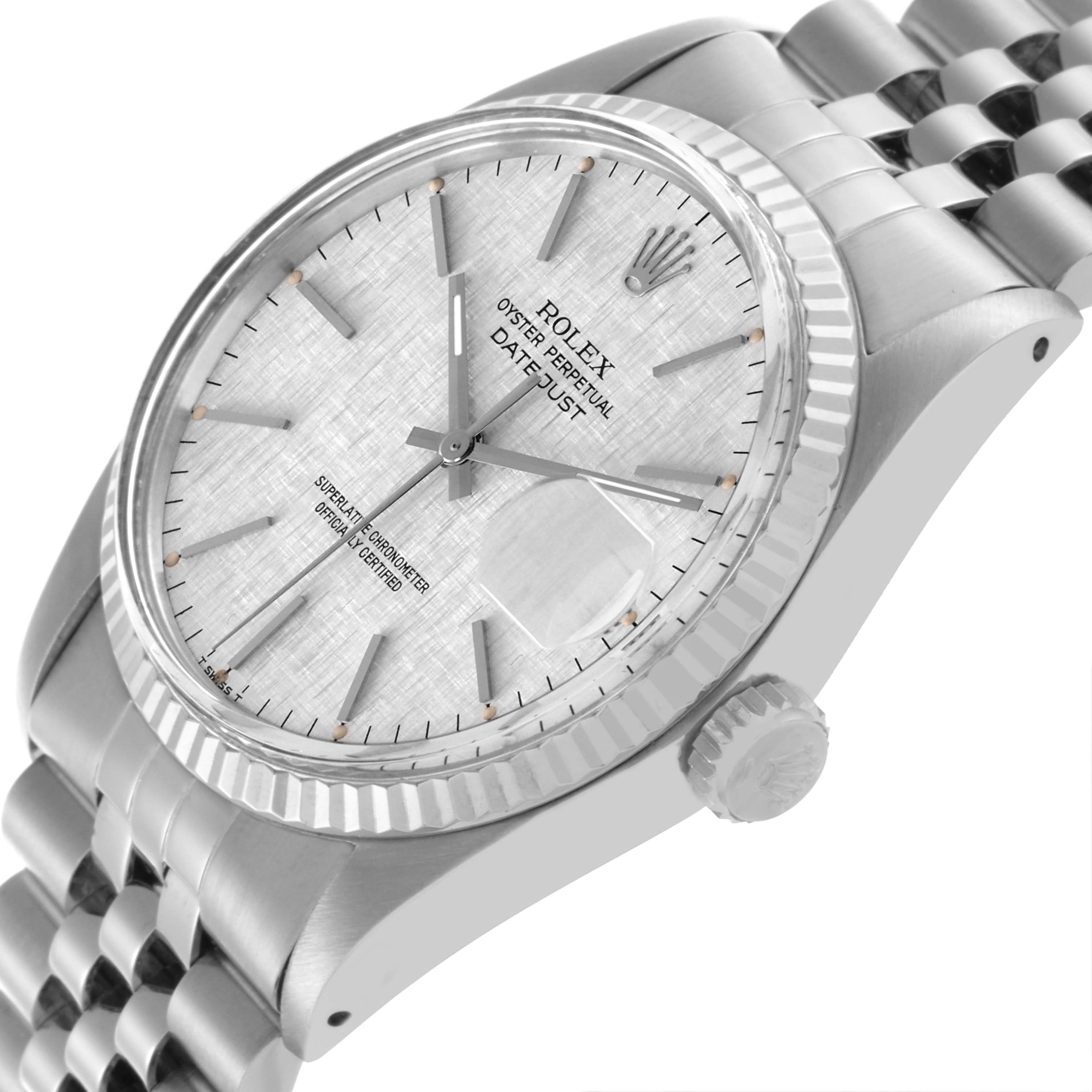 The Rolex Datejust 16014 Men
s Stainless Steel Silver Dial 16014 Men
s Stainless Steel Silver Dial watch is shown at a slight angle, highlighting the dial, bezel, crown, and a portion of the bracelet.