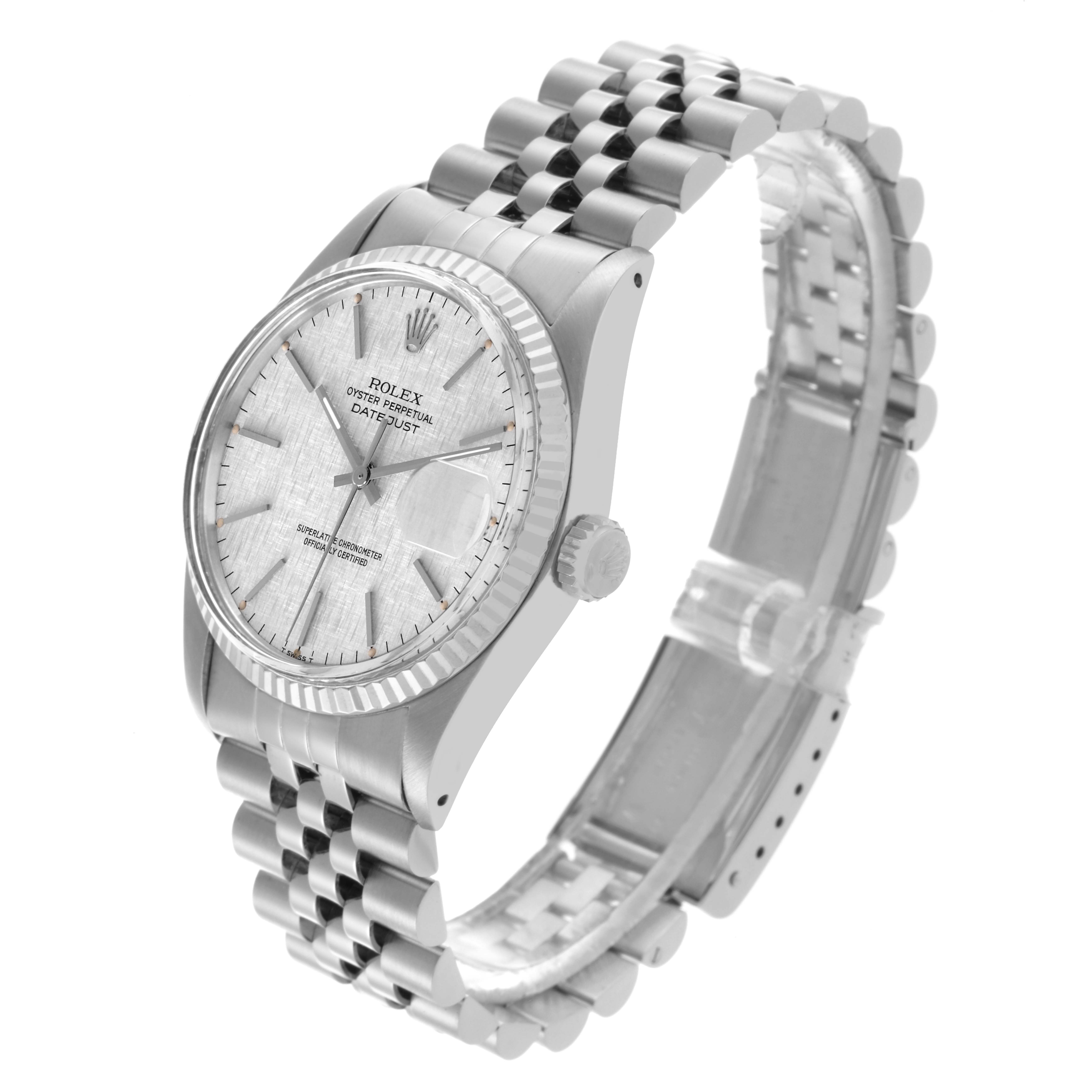 The Rolex Datejust 16014 Men
s Stainless Steel Silver Dial 16014 Men
s Stainless Steel Silver Dial watch is shown at a three-quarter angle, displaying the dial, fluted bezel, and Jubilee bracelet.