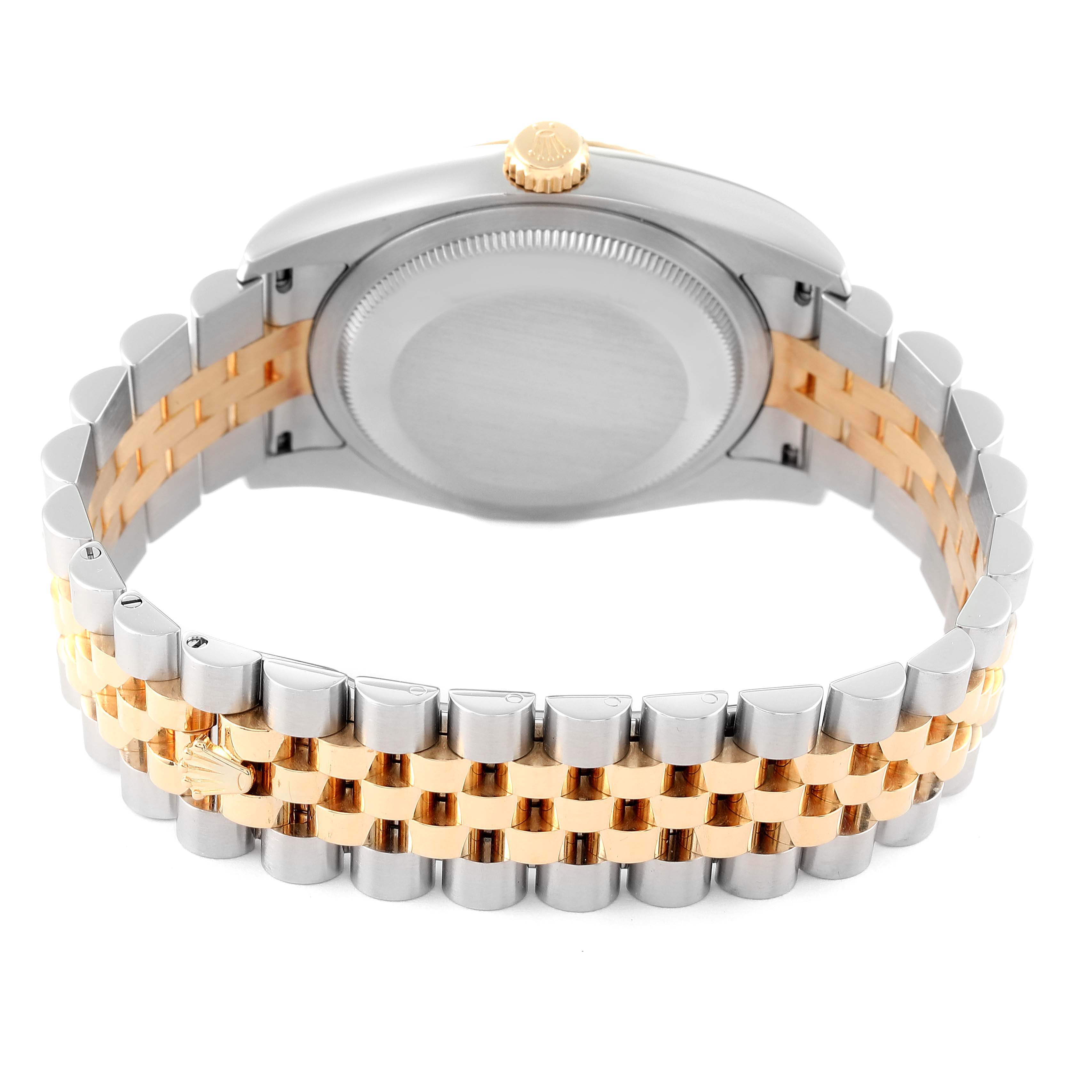 The image shows the backside and the bracelet of a Rolex Datejust 116233 Men's Steel and Gold (two tone) Champagne Dial 116233 Men's Steel and Gold (two tone) Champagne Dial watch, featuring a two-tone metal design.