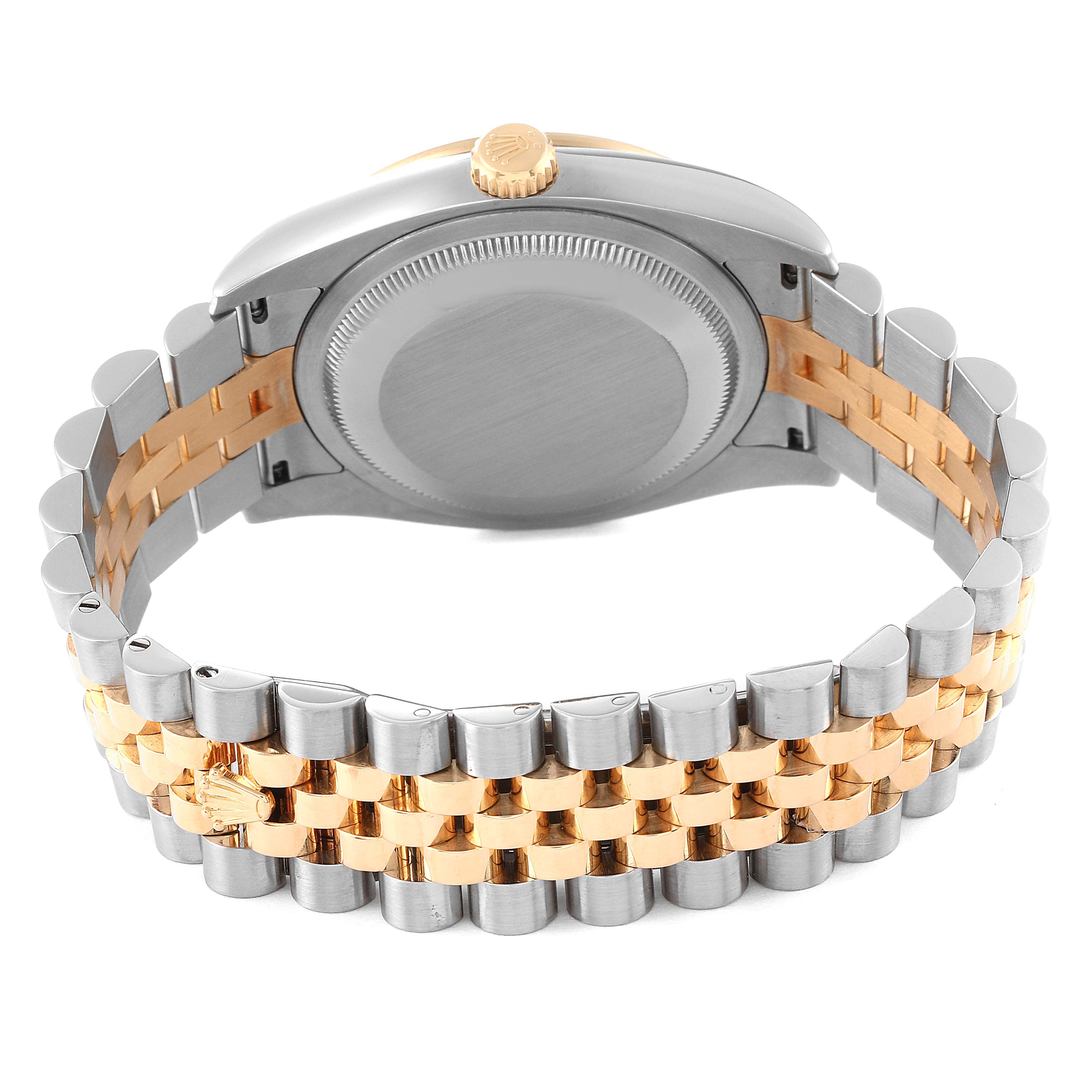 The image shows the back view of a Rolex Datejust 116243 Men's Steel and Gold (two tone) Silver Dial 116243 Men's Steel and Gold (two tone) Silver Dial watch, highlighting its case back, crown, and two-tone bracelet.