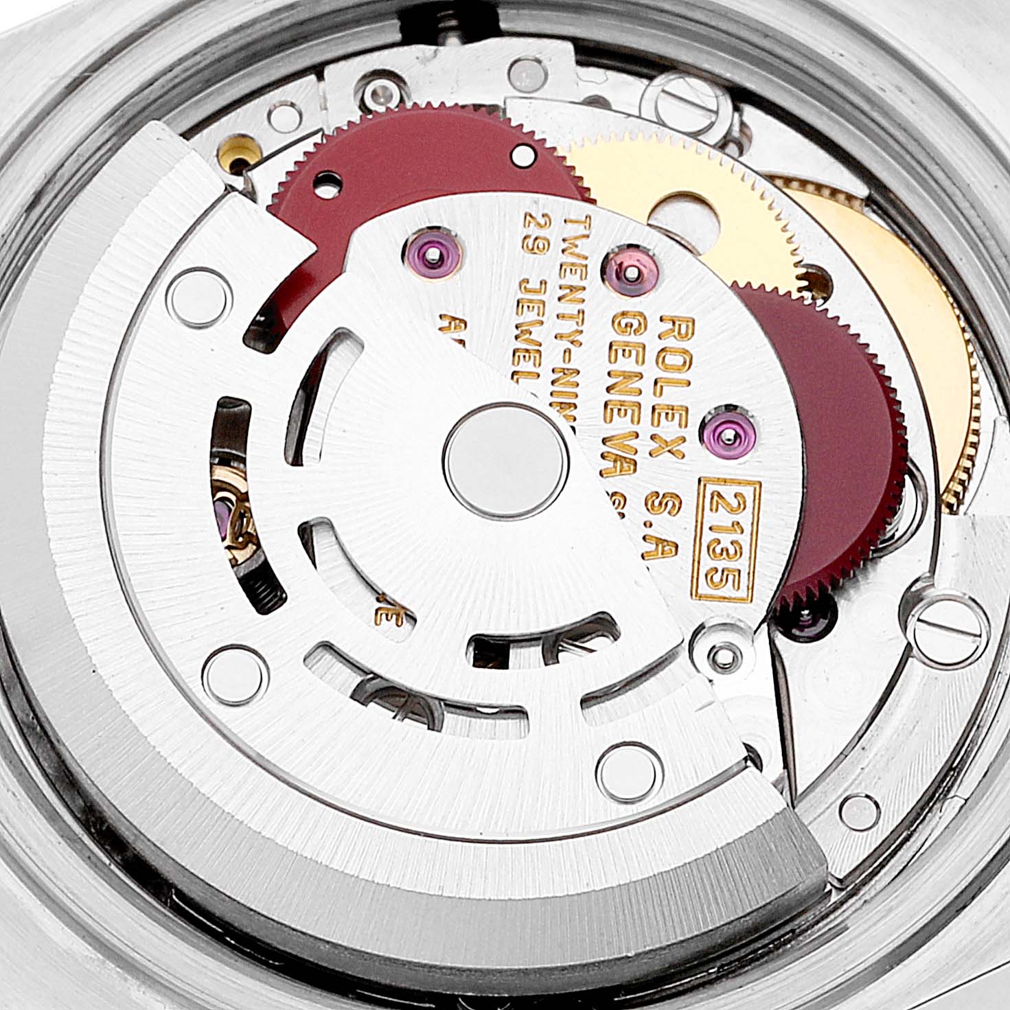 The image shows a close-up of the internal mechanism of a Rolex Datejust 69173 Women's Steel and Gold (two tone) Blue Dial 69173 Women's Steel and Gold (two tone) Blue Dial watch, highlighting gears and the rotor.