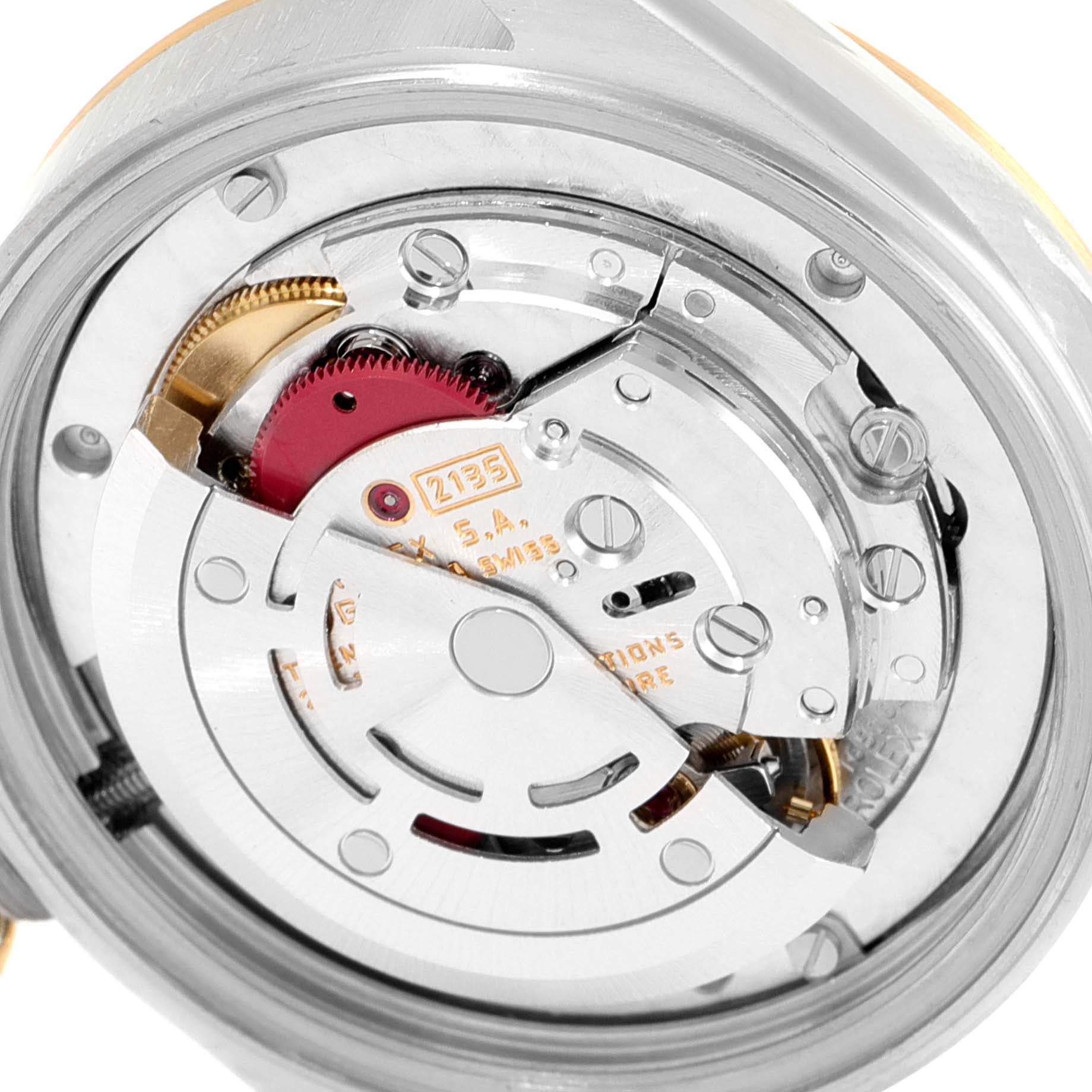 This is a close-up view of the inner mechanism of the Rolex Mid-Size 68273 Women
s Steel and Gold (two tone) Champagne Dial 68273 Women
s Steel and Gold (two tone) Champagne Dial watch, focusing on the movement components.
