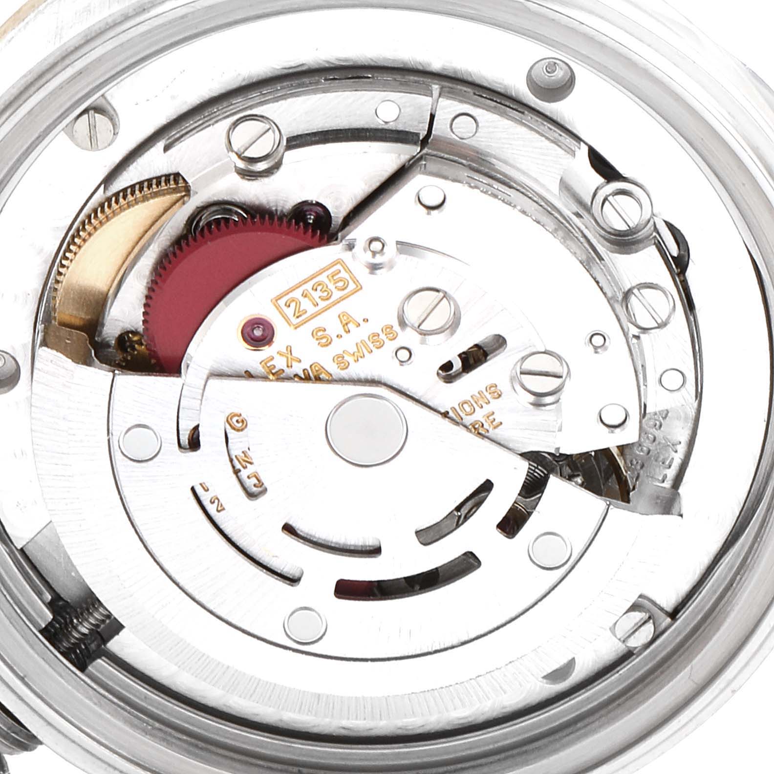This image shows a close-up of the internal movement components of a Rolex Mid-Size 68273 Women's Steel and Gold (two tone) Beige Dial 68273 Women's Steel and Gold (two tone) Beige Dial model watch.