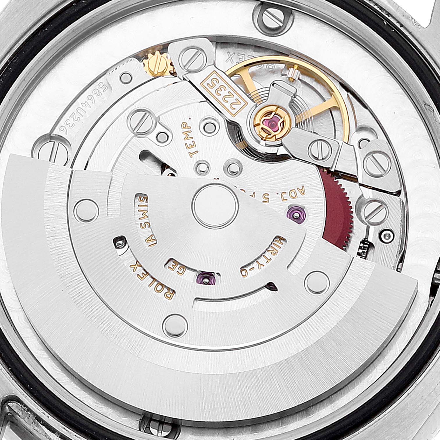 This image shows a close-up of the movement mechanism inside the Rolex Mid-Size 178384 Women
s Stainless Steel Silver Dial 178384 Women
s Stainless Steel Silver Dial watch.