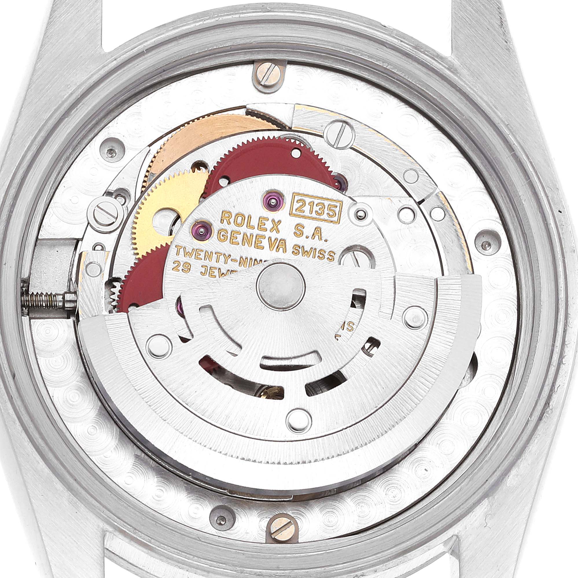 The image shows the back view of a Rolex Mid-Size 68274 Women
s Stainless Steel Pink Dial 68274 Women
s Stainless Steel Pink Dial model, focusing on the internal mechanics and movement components.