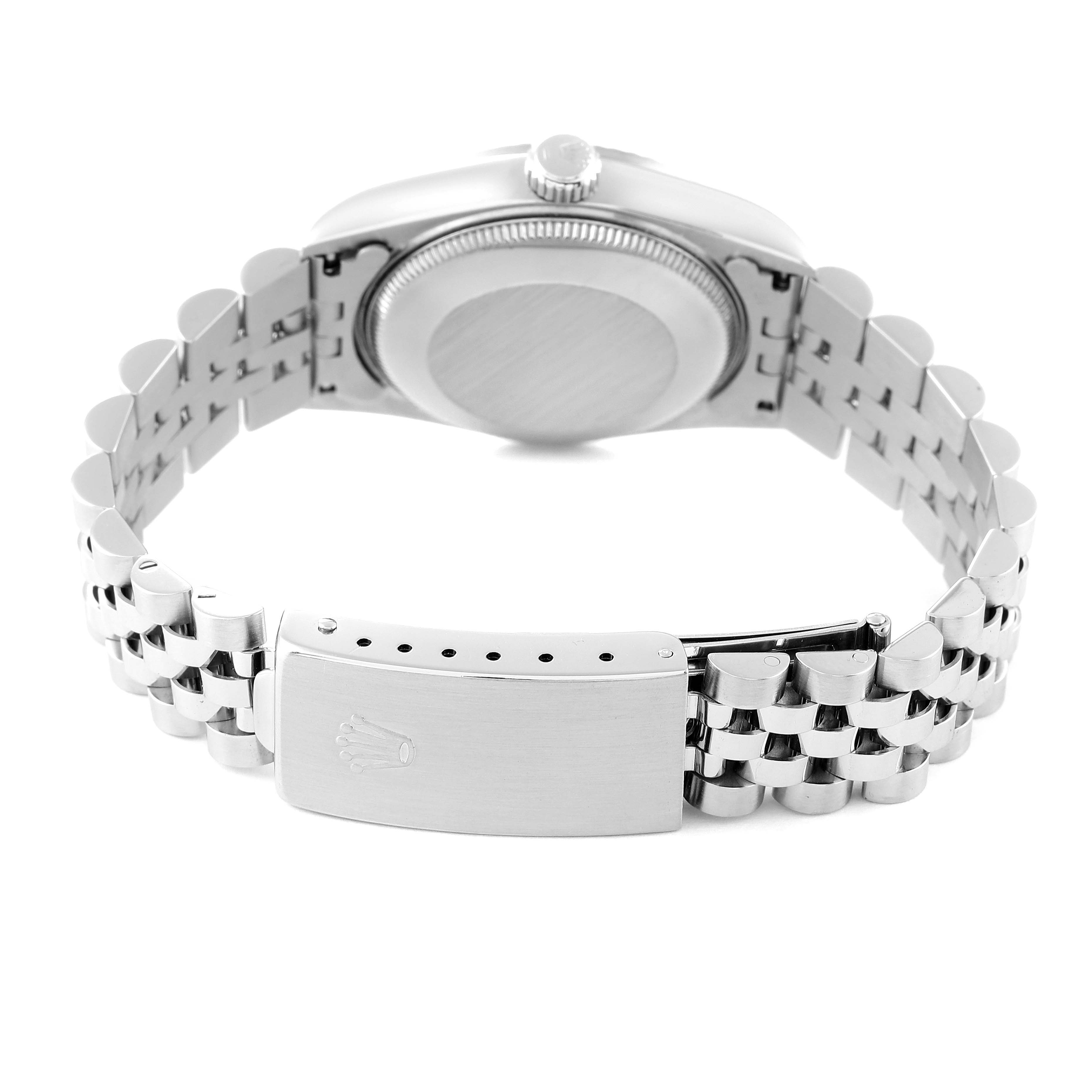 The image shows the back view of a Rolex Mid-Size 68274 Women
s Stainless Steel Pink Dial 68274 Women
s Stainless Steel Pink Dial watch, highlighting its clasp, bracelet, and case back.