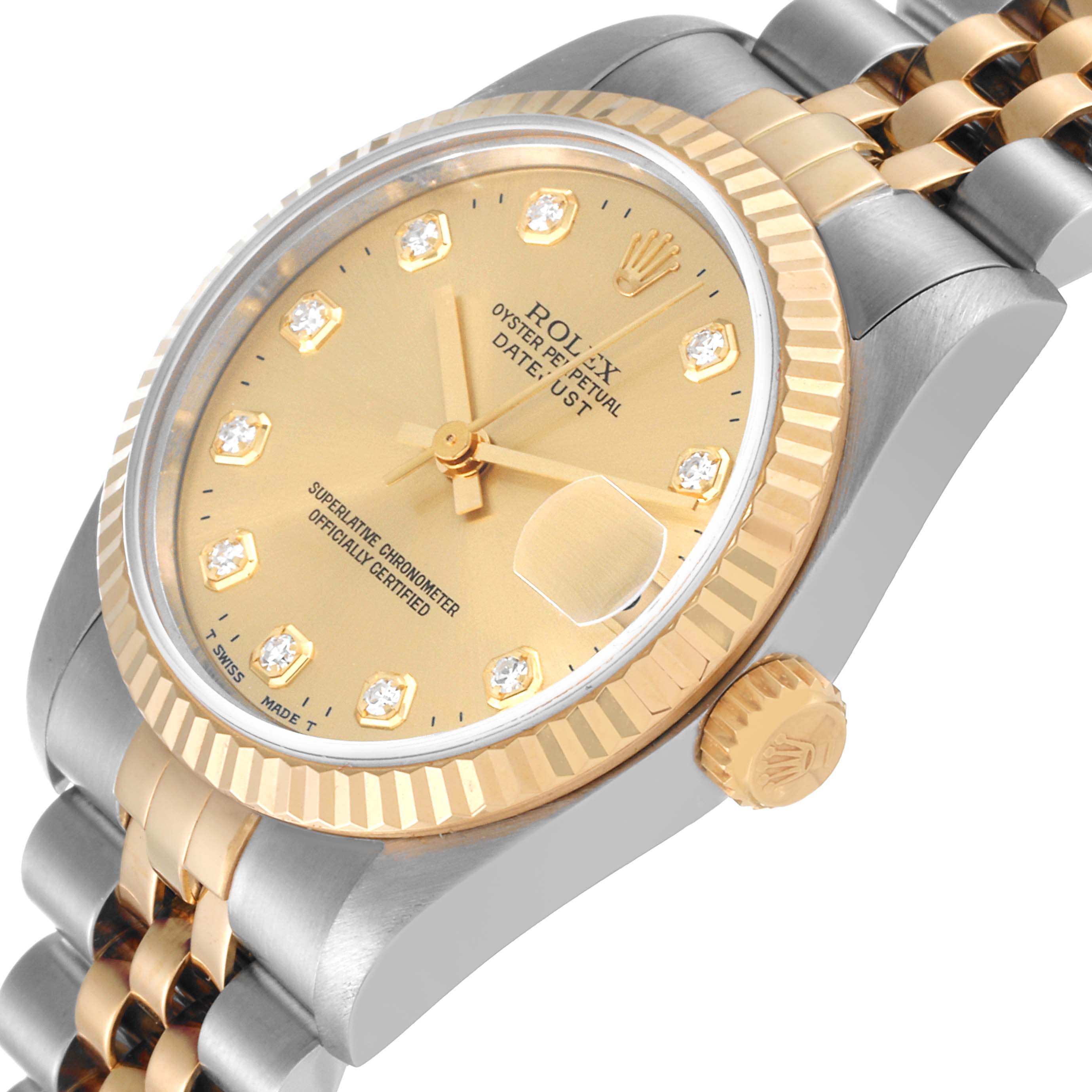 This image shows a Rolex Mid-Size 68273 Women
s Steel and Gold (two tone) Champagne Dial 68273 Women
s Steel and Gold (two tone) Champagne Dial Datejust watch at an angle highlighting its dial, bezel, crown, and part of the bracelet.