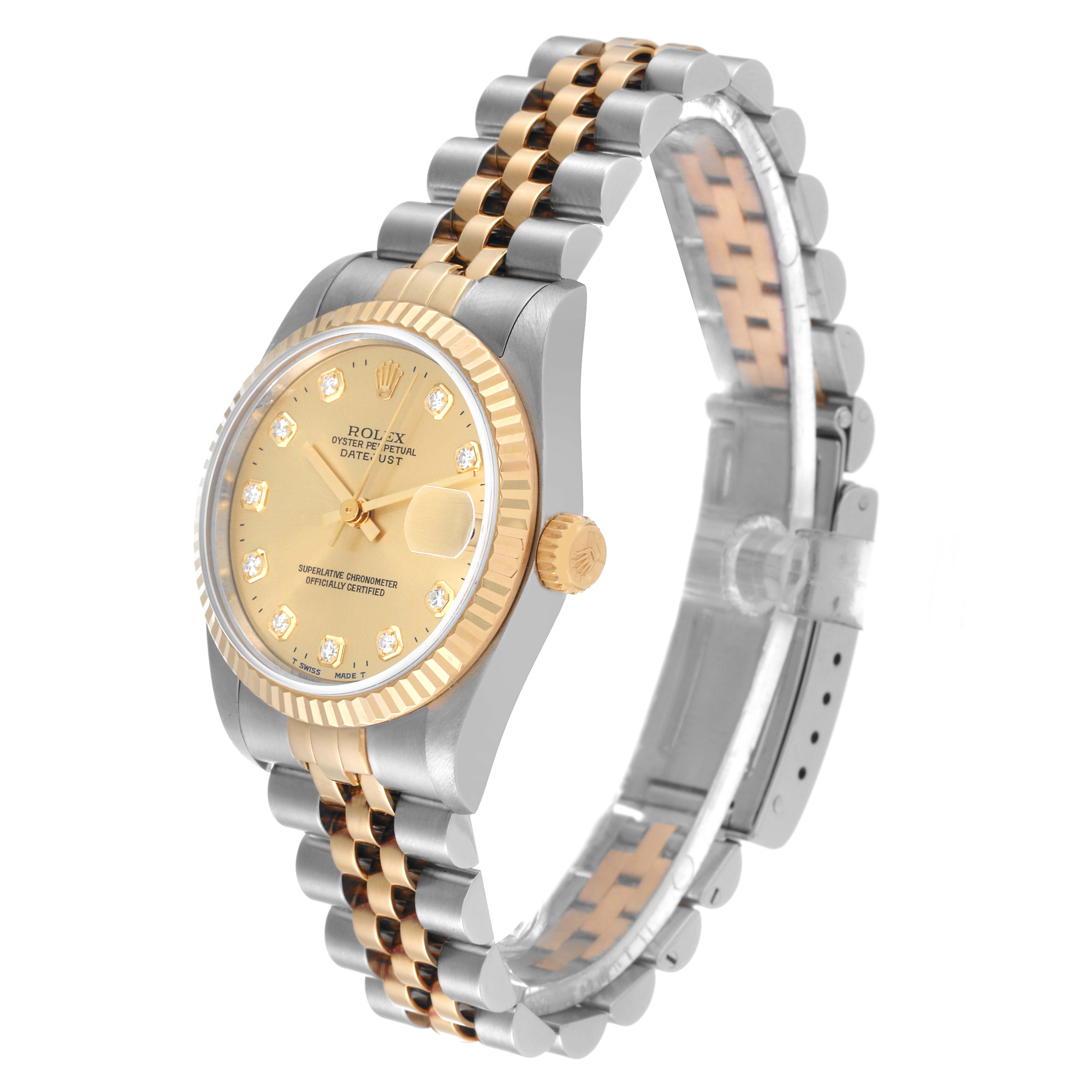 This Rolex Mid-Size 68273 Women
s Steel and Gold (two tone) Champagne Dial 68273 Women
s Steel and Gold (two tone) Champagne Dial Datejust watch is angled to show its face, bezel, crown, and two-tone bracelet.