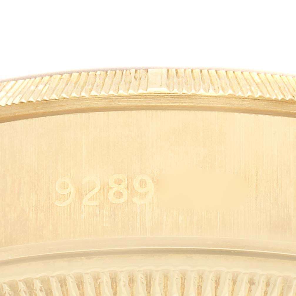 The image shows a close-up of the case back edge and some engraving on a Rolex President 69278G Women
s Yellow Gold Champagne Dial 69278G Women
s Yellow Gold Champagne Dial model watch.