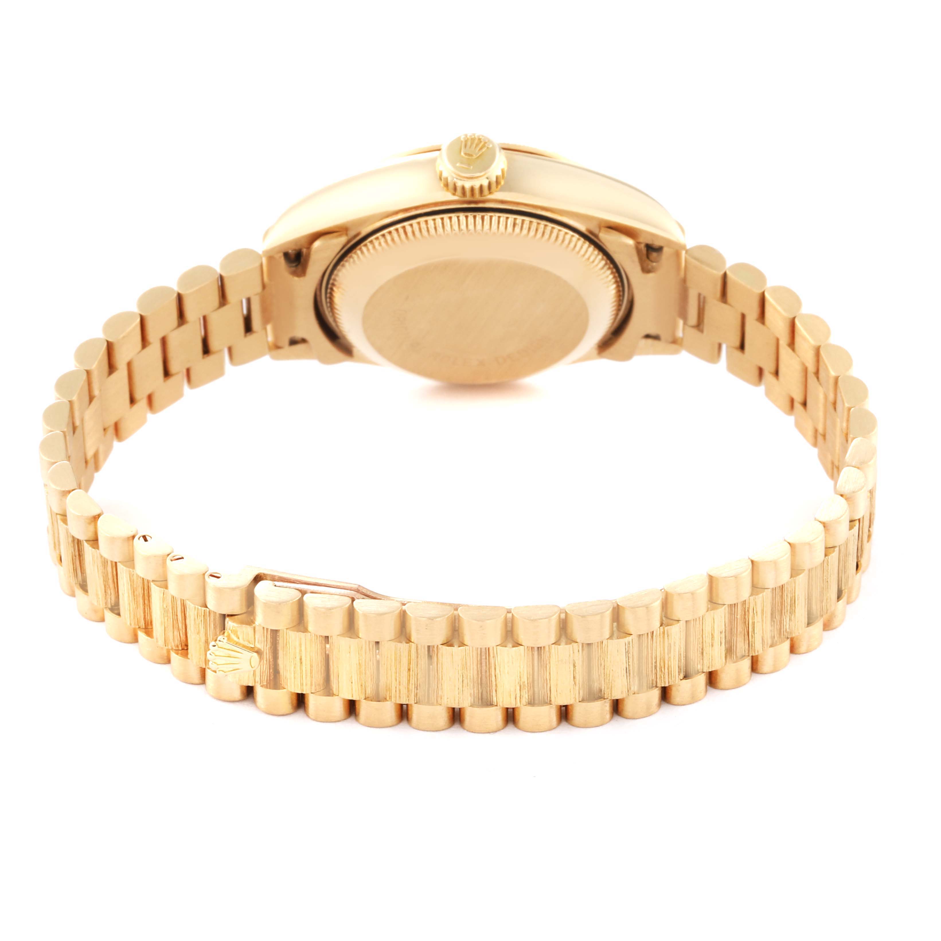 The image shows the back and bracelet of a Rolex President 69278G Women
s Yellow Gold Champagne Dial 69278G Women
s Yellow Gold Champagne Dial model watch.