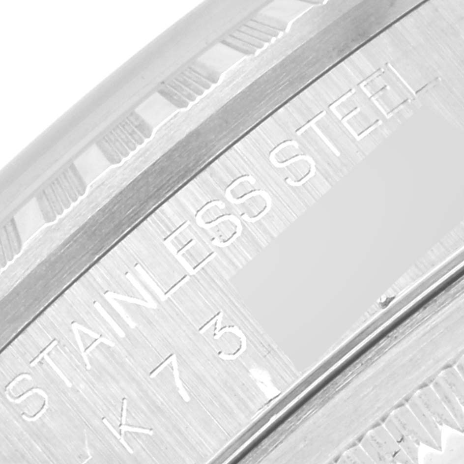 This is a close-up image of the inner case with "Stainless Steel" engraving on a Rolex Datejust 16220 Men's Stainless Steel Silver Dial 16220 Men's Stainless Steel Silver Dial watch.