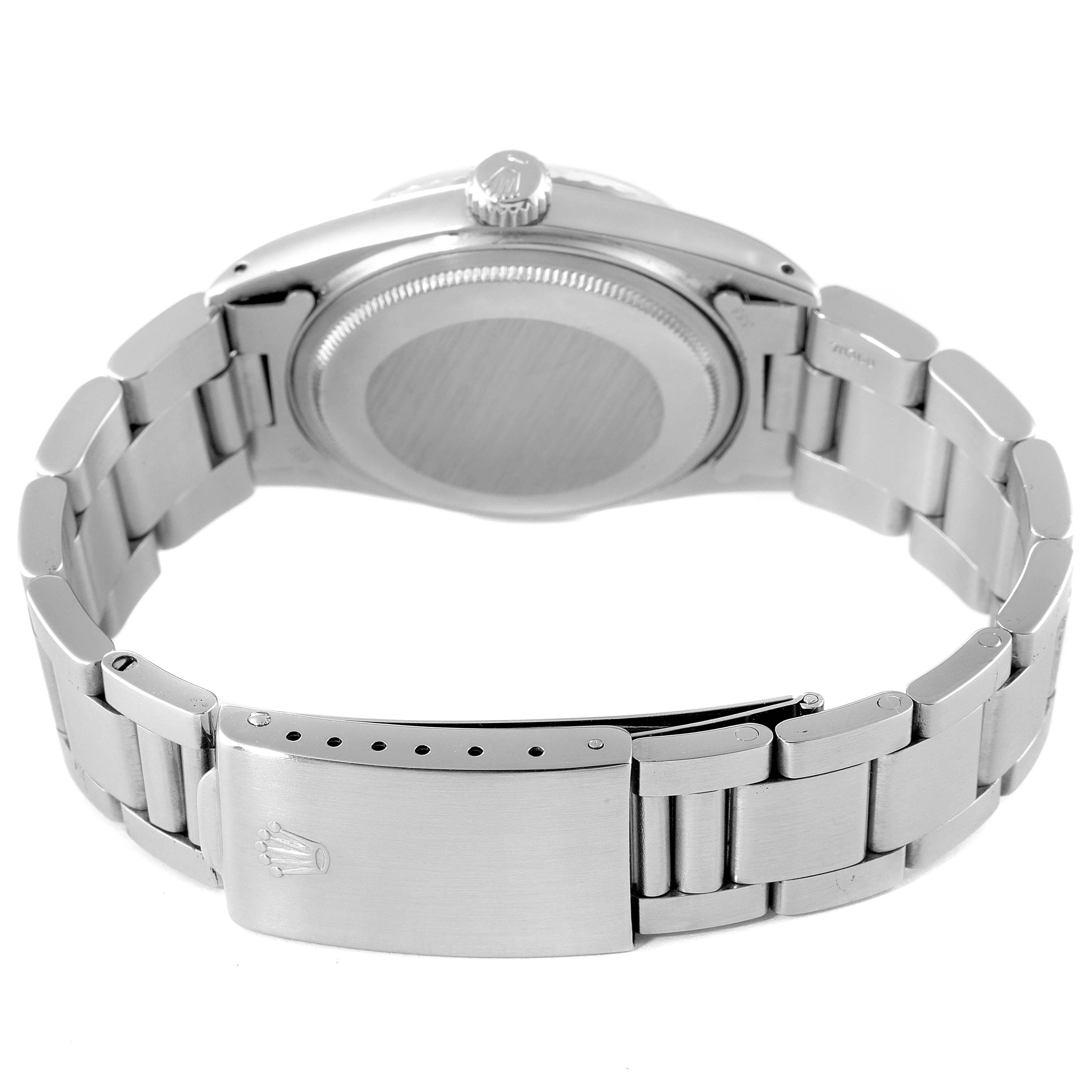 The image shows the back of the Rolex Vintage Collection 1603 Men's Stainless Steel Silver Dial 1603 Men's Stainless Steel Silver Dial watch, including the case back, bracelet, and clasp.