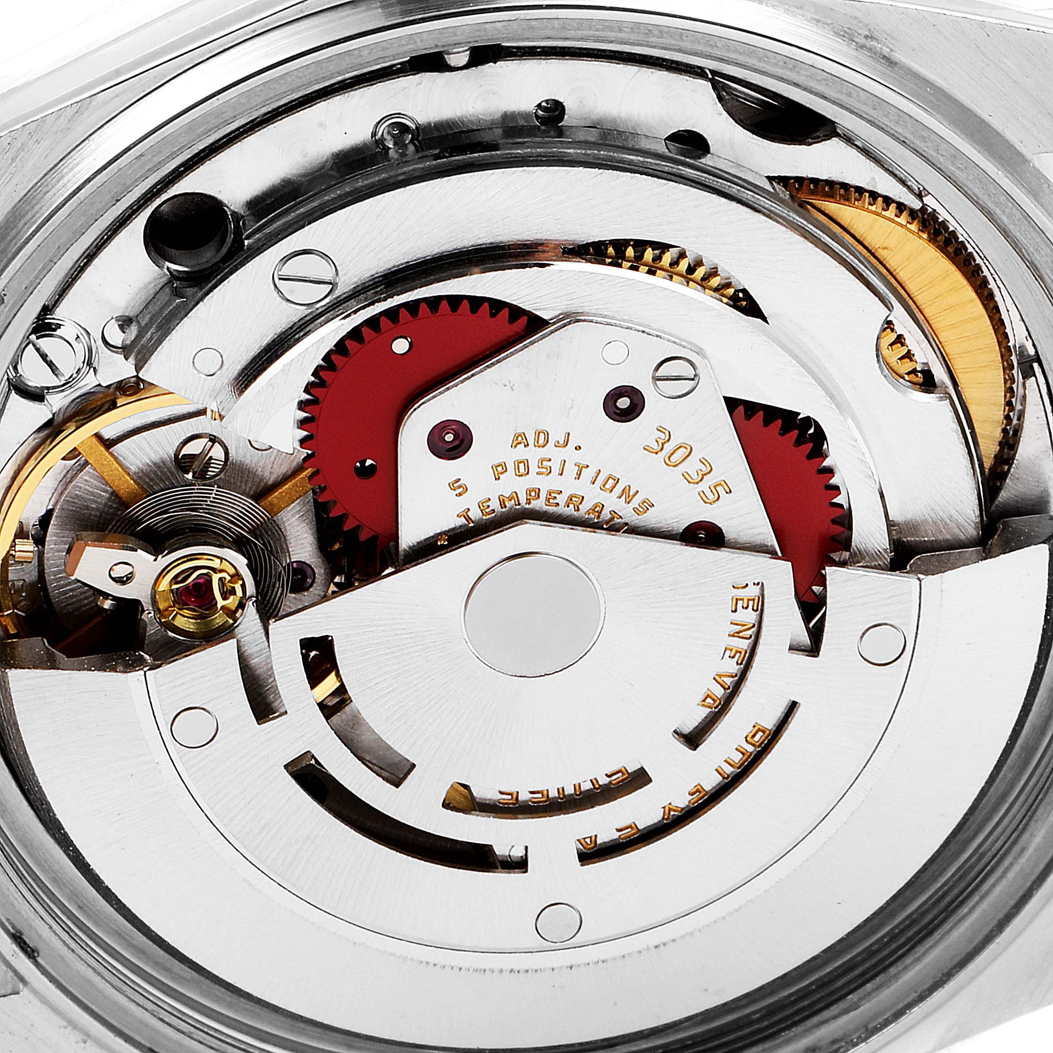 This image shows the intricate inner workings of a Vintage Collection model by Rolex, highlighting gears and the movement mechanism.