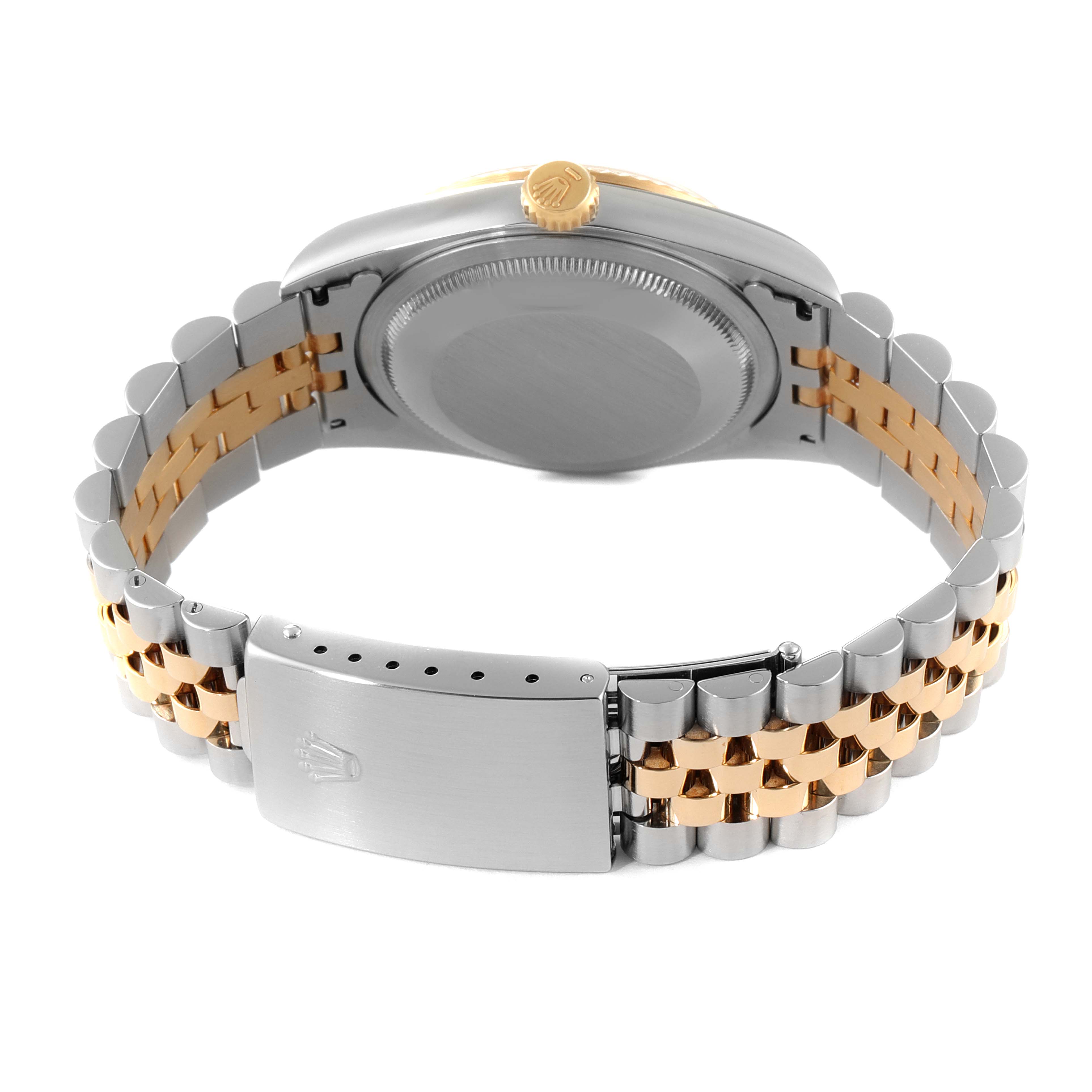 The image shows the back of a Rolex Datejust 16233 Men
s Steel and Gold (two tone) Champagne Dial 16233 Men
s Steel and Gold (two tone) Champagne Dial watch and its two-tone bracelet with a closed clasp.