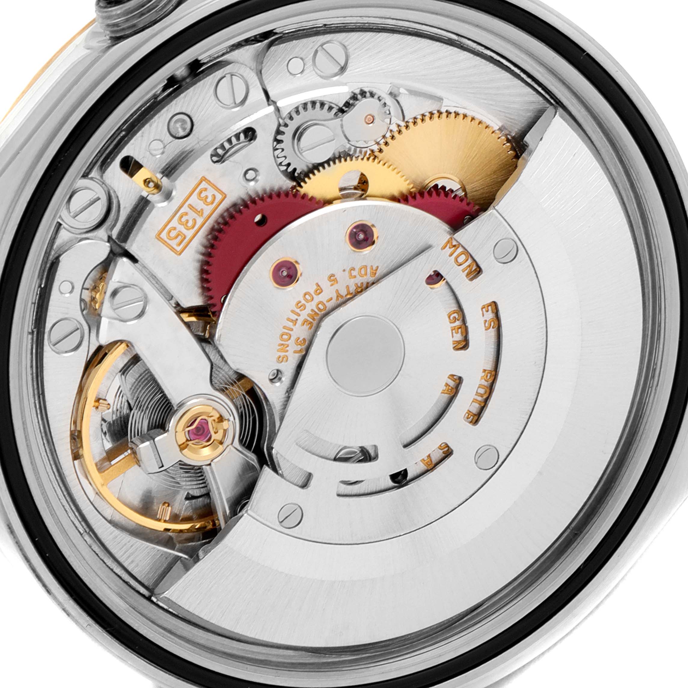 This is a close-up view of the internal mechanical movement of a Rolex Datejust 16233 Men's Steel and Gold (two tone) Black Dial 16233 Men's Steel and Gold (two tone) Black Dial watch.