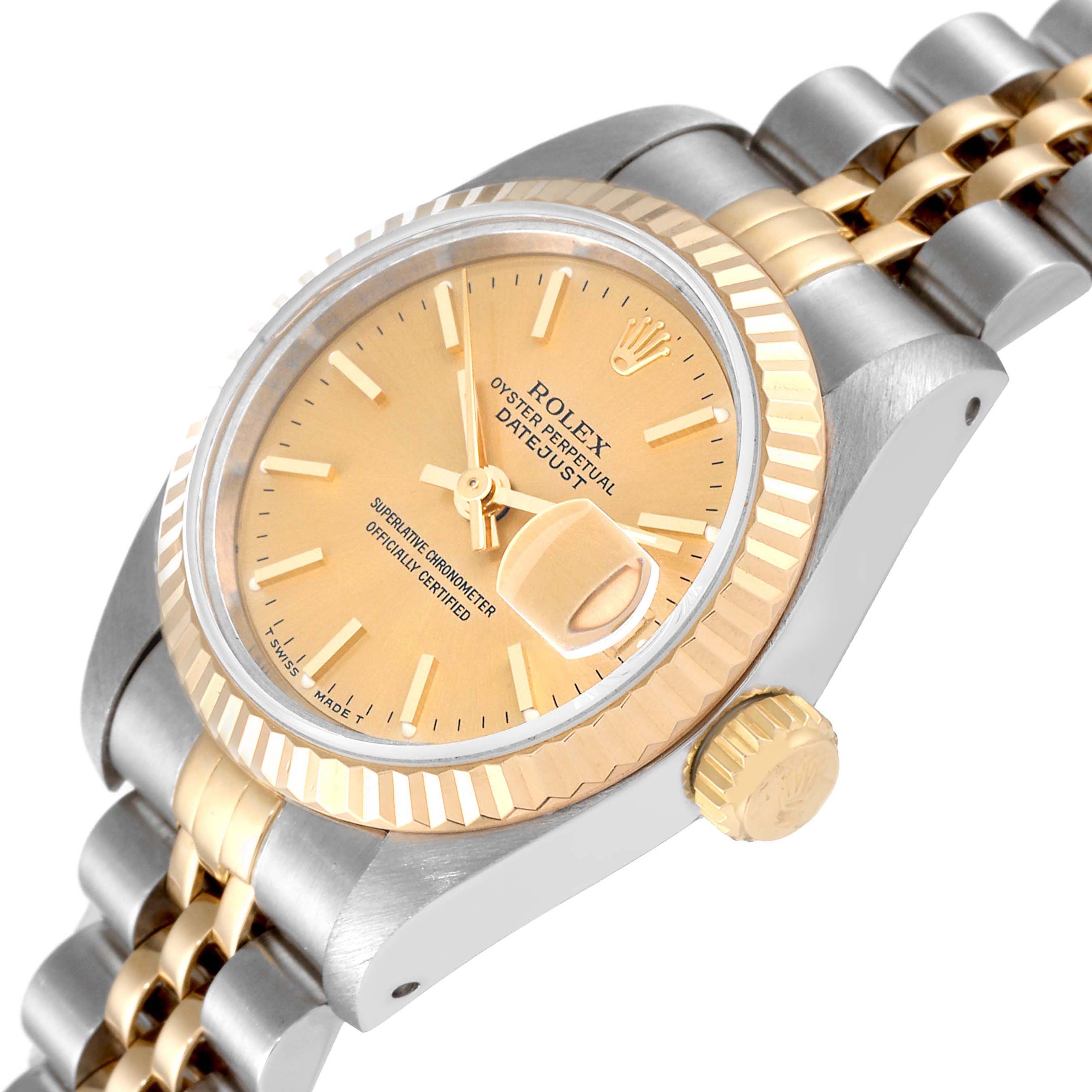 The watch is a Rolex Datejust 69173 Women's Steel and Gold (two tone) Champagne Dial 69173 Women's Steel and Gold (two tone) Champagne Dial model, shown at a tilted angle highlighting the face, bezel, crown, and part of the bracelet.