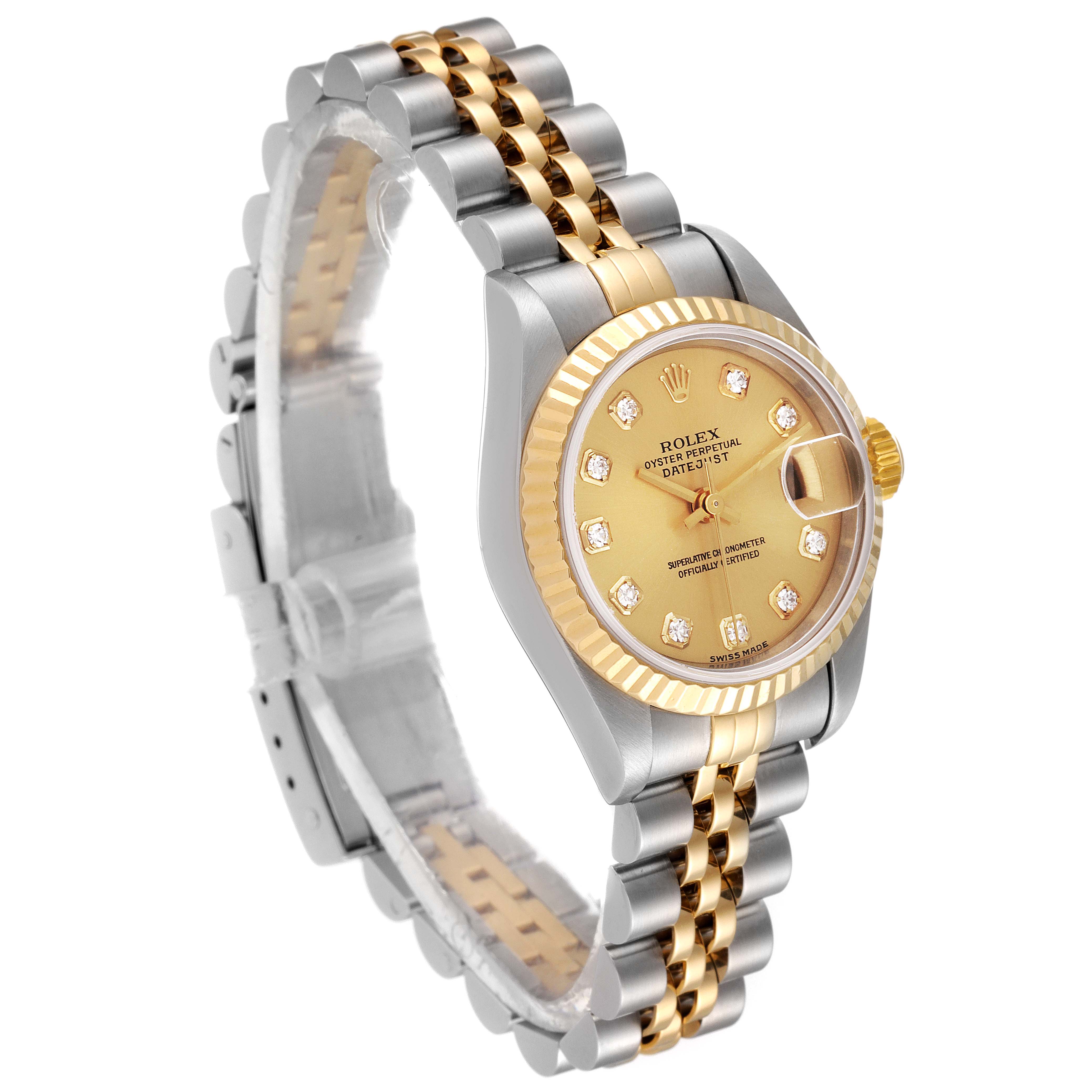 The image shows a side-angle view of a Rolex Datejust 79173 Women
s Steel and Gold (two tone) Champagne Dial 79173 Women
s Steel and Gold (two tone) Champagne Dial watch, highlighting its gold and silver band, and diamond-accented face.