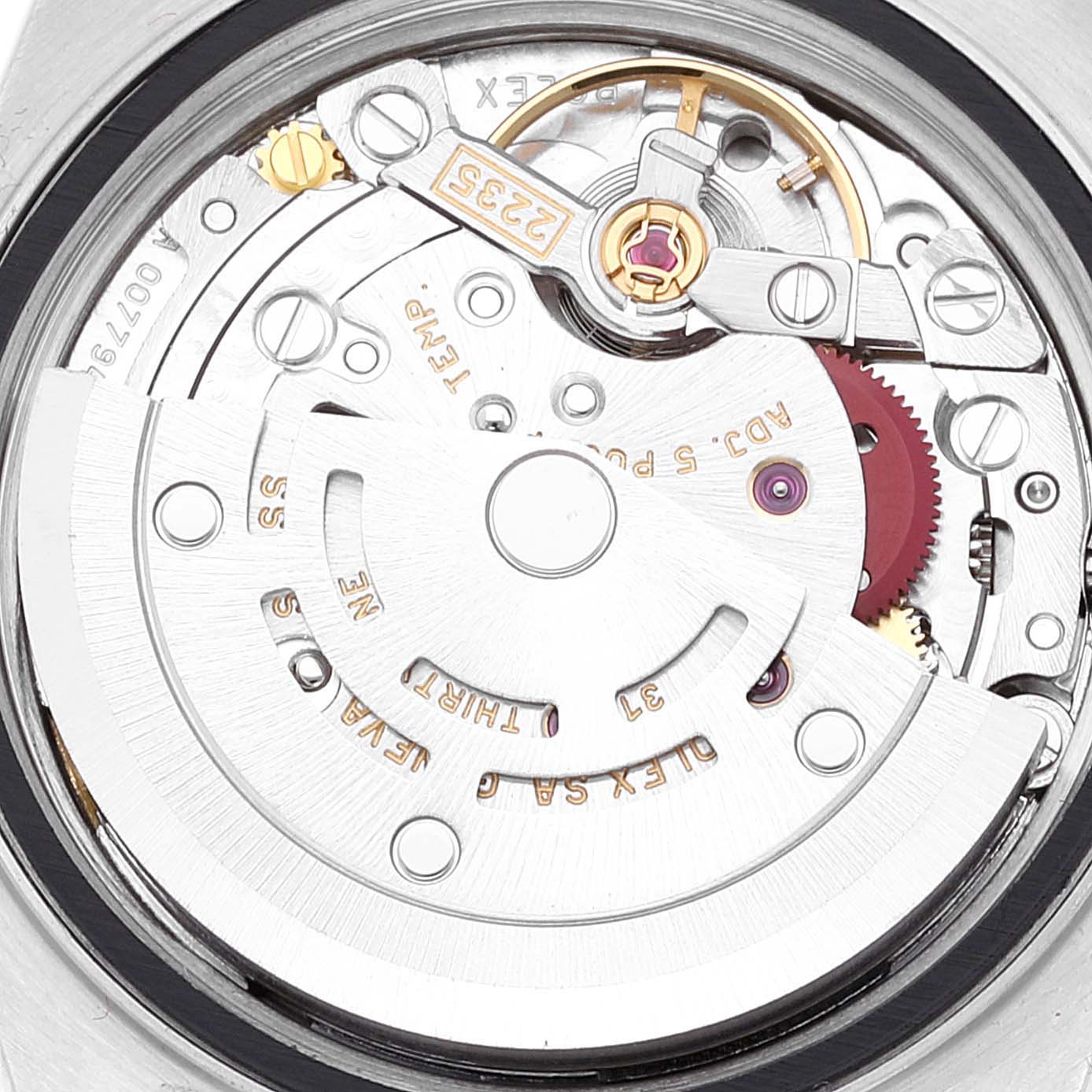 The image shows a close-up of the movement (caliber 2235) of a Rolex Datejust 79173 Women's Steel and Gold (two tone) Champagne Dial 79173 Women's Steel and Gold (two tone) Champagne Dial watch.