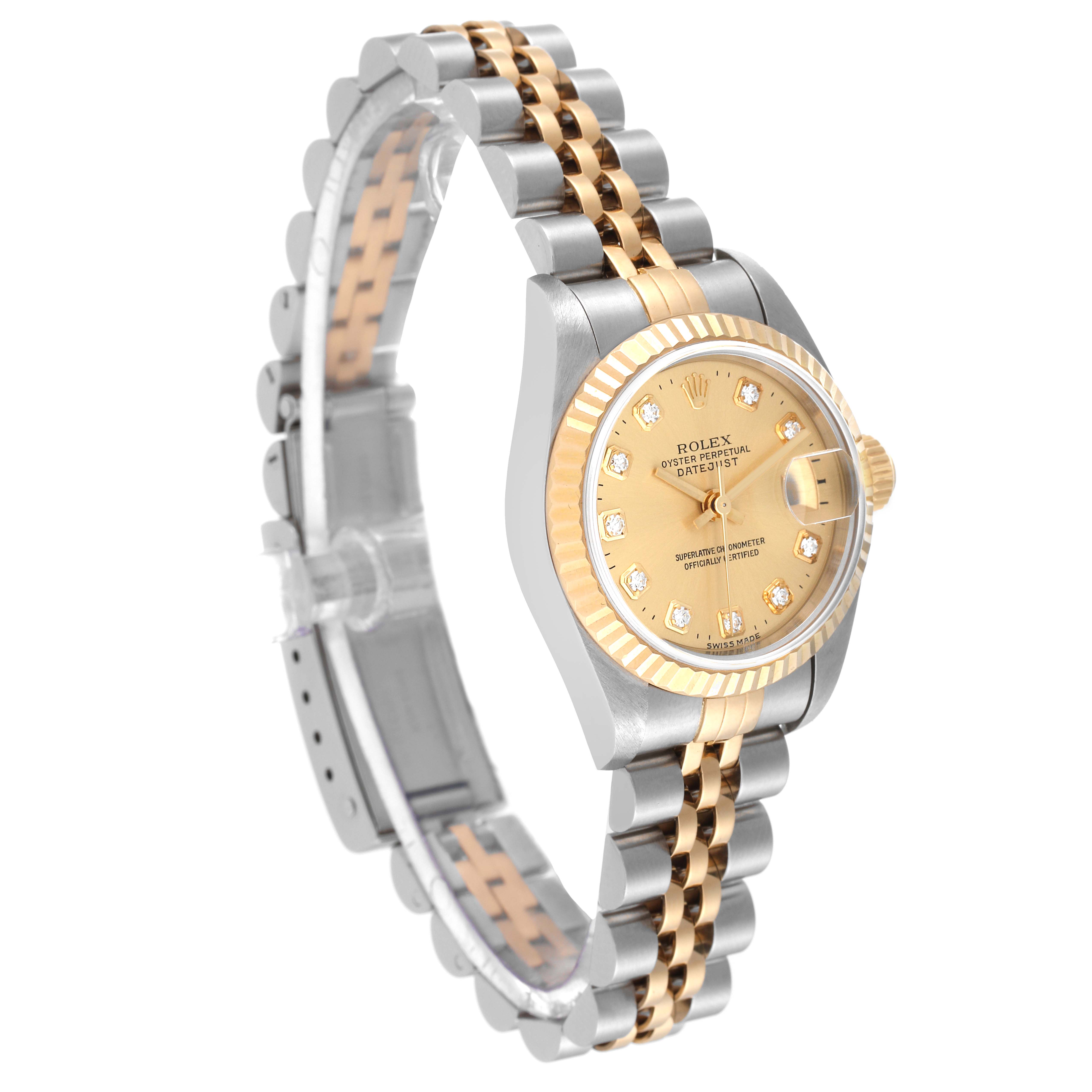 The Rolex Datejust 79173 Women's Steel and Gold (two tone) Champagne Dial 79173 Women's Steel and Gold (two tone) Champagne Dial watch is shown at an angle, highlighting its gold and silver dial, fluted bezel, and two-tone bracelet.