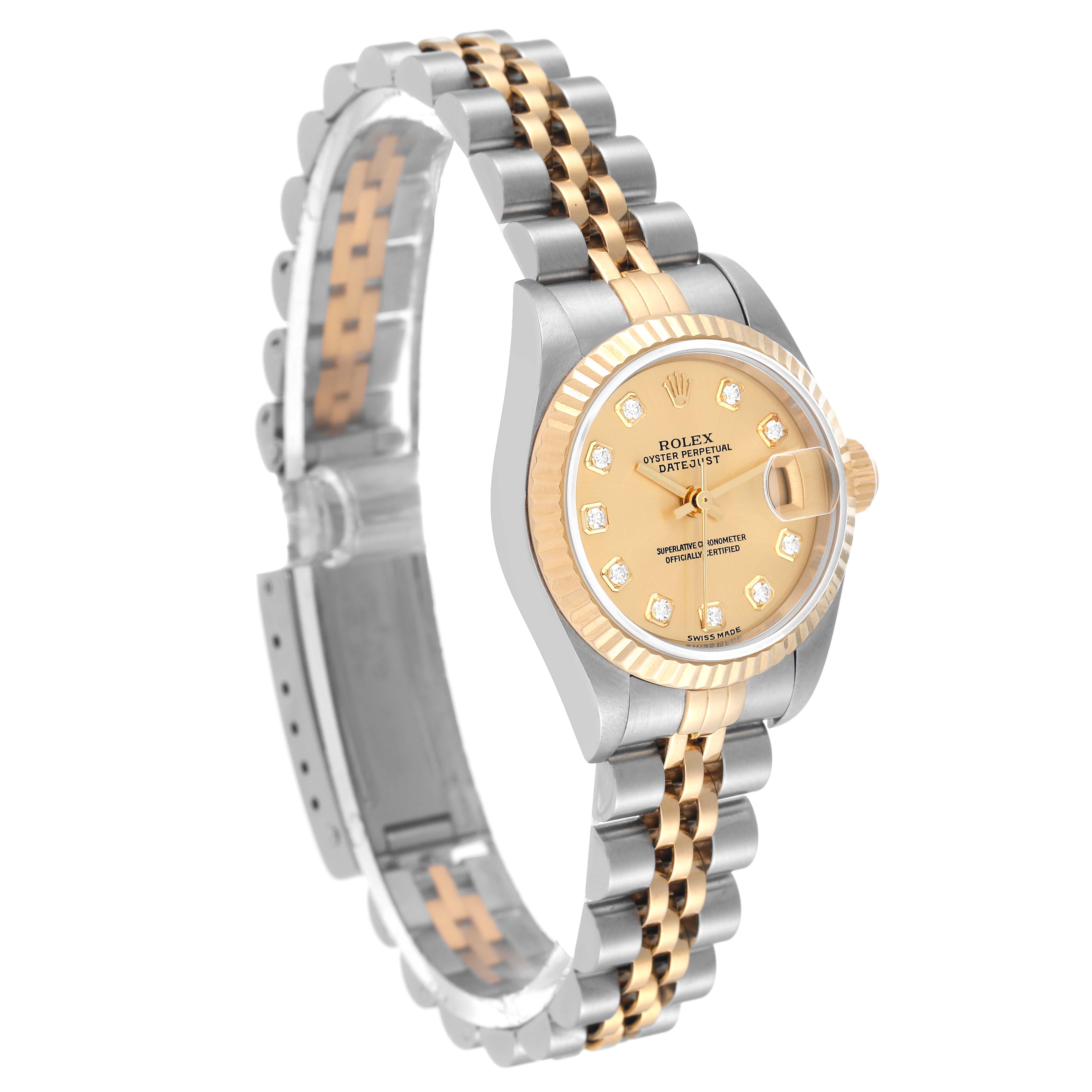 The image shows a Rolex Datejust 79173 Women's Steel and Gold (two tone) Champagne Dial 79173 Women's Steel and Gold (two tone) Champagne Dial watch at an oblique angle, highlighting its two-tone metal bracelet and diamond-accented dial.