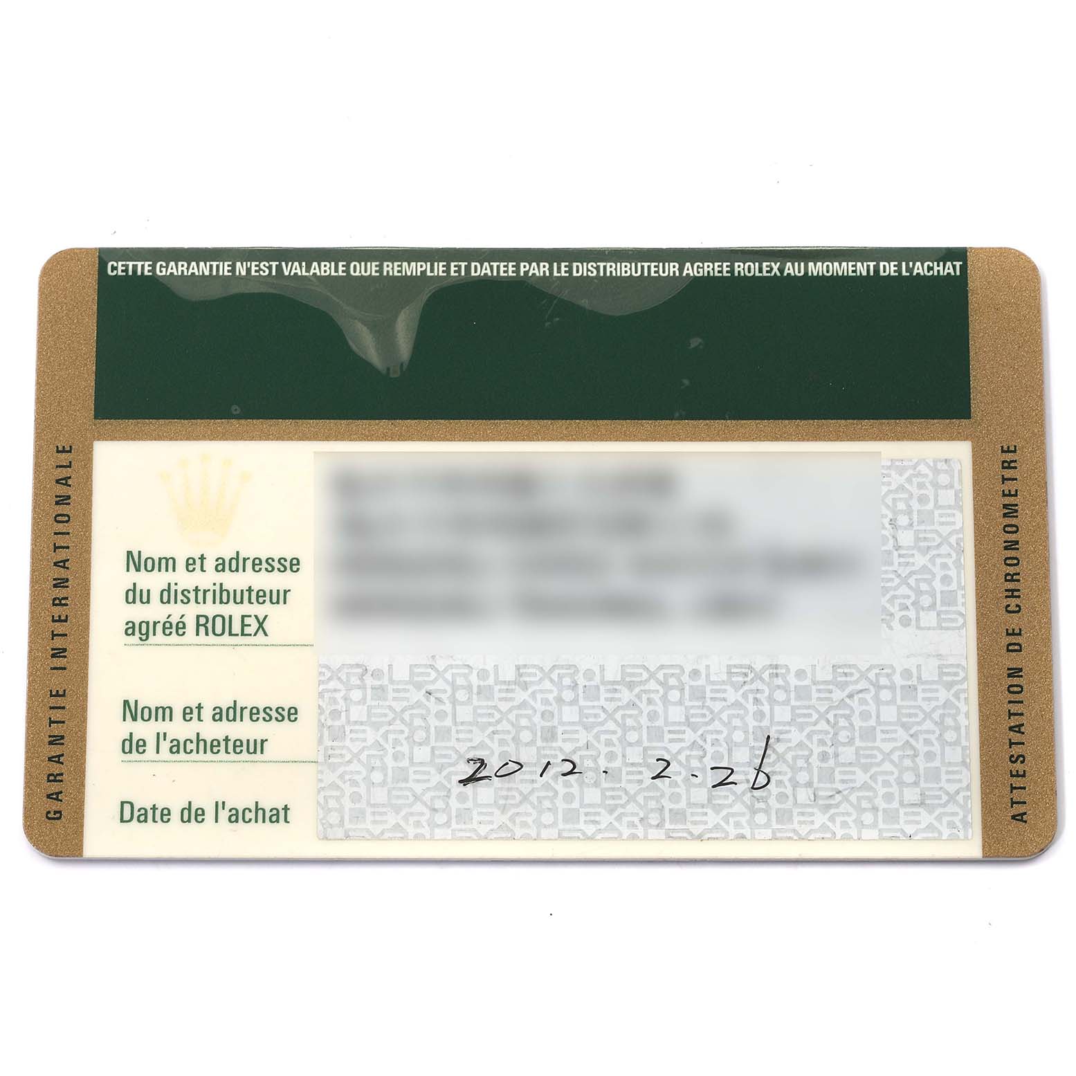 This image shows the guarantee card for a Rolex Datejust 116233 Men's Steel and Gold (two tone) Champagne Dial 116233 Men's Steel and Gold (two tone) Champagne Dial watch from a top-down angle.