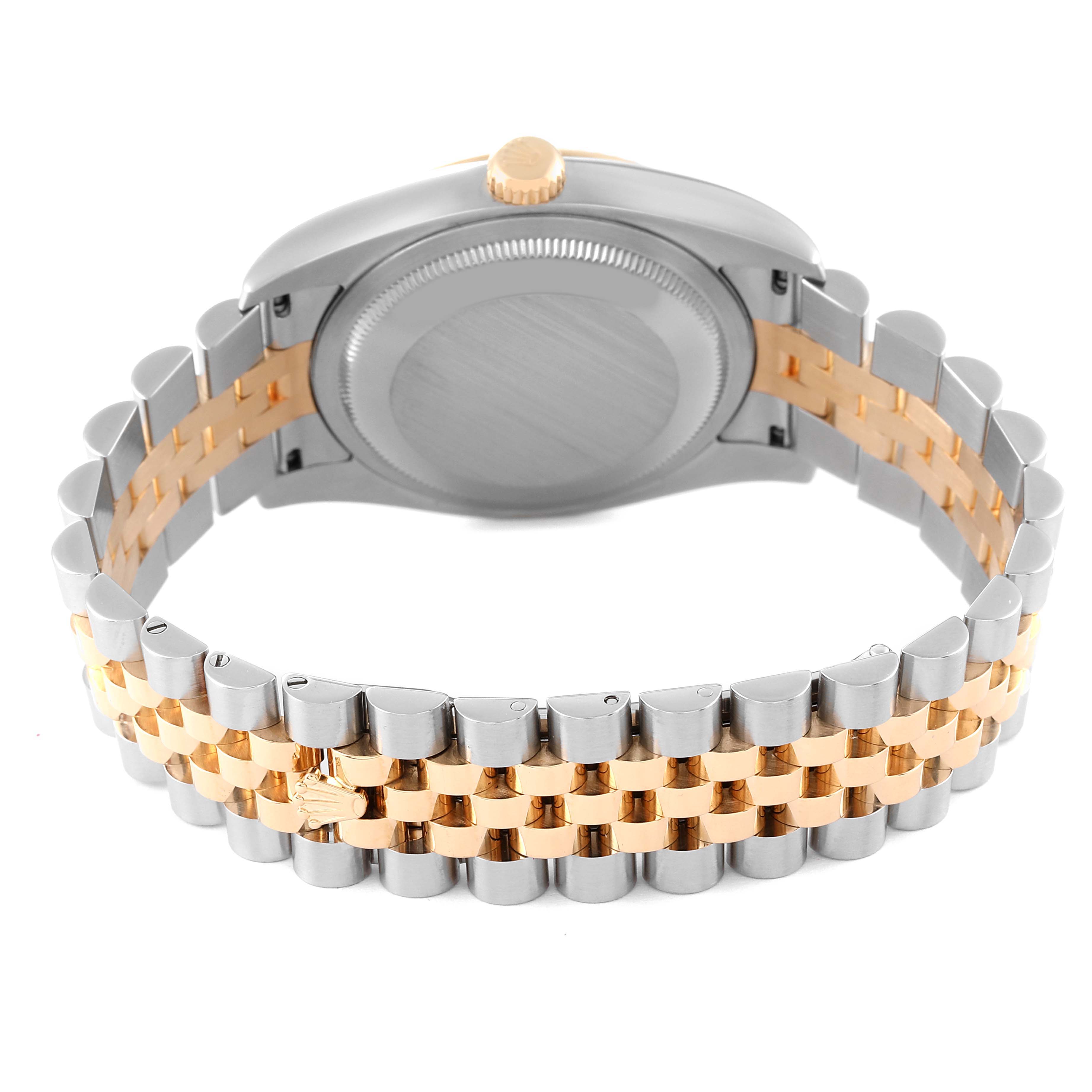 The image shows the back casing and bracelet of a Rolex Datejust 116233 Men's Steel and Gold (two tone) Champagne Dial 116233 Men's Steel and Gold (two tone) Champagne Dial watch, with a two-tone metal design.