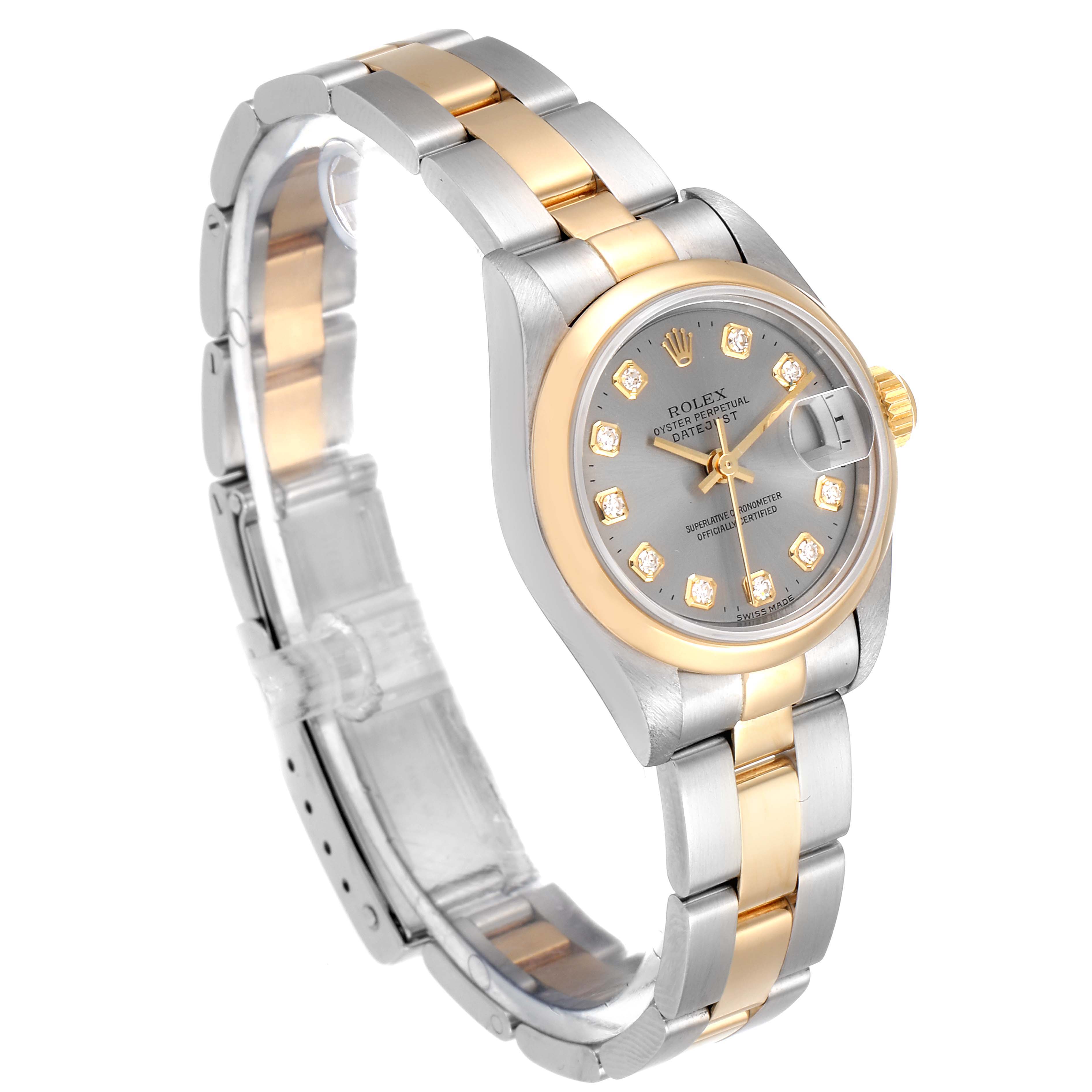 This Rolex Datejust 69163 Women's Steel and Gold (two tone) Grey Dial 69163 Women's Steel and Gold (two tone) Grey Dial watch is shown from an angled side view, displaying its dial, bezel, and bracelet.