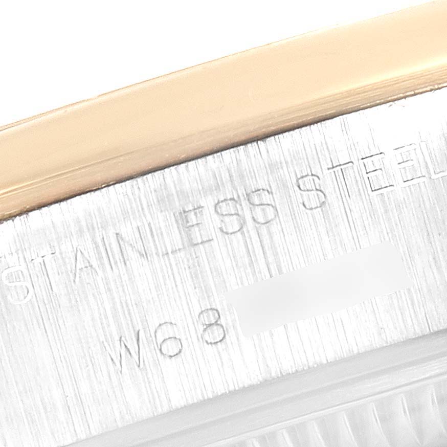 This image shows a close-up view of the stainless steel side of a Rolex Datejust 69163 Women's Steel and Gold (two tone) Grey Dial 69163 Women's Steel and Gold (two tone) Grey Dial watch case.