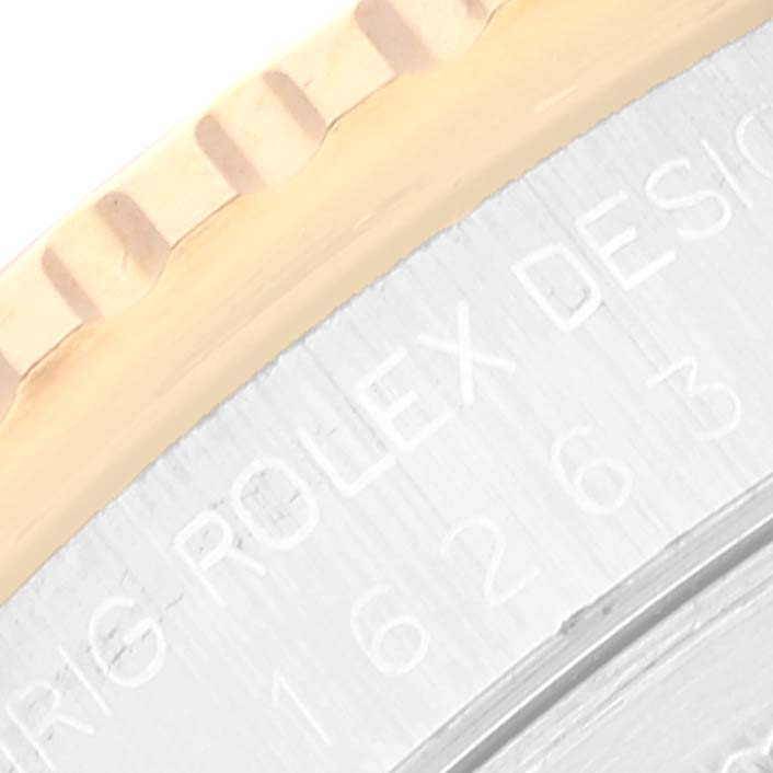 The image shows a close-up of the bezel and part of the engraved inner ring of a Rolex Turn-o-Graph 16263 Men's Steel and Gold (two tone) Champagne Dial 16263 Men's Steel and Gold (two tone) Champagne Dial watch.