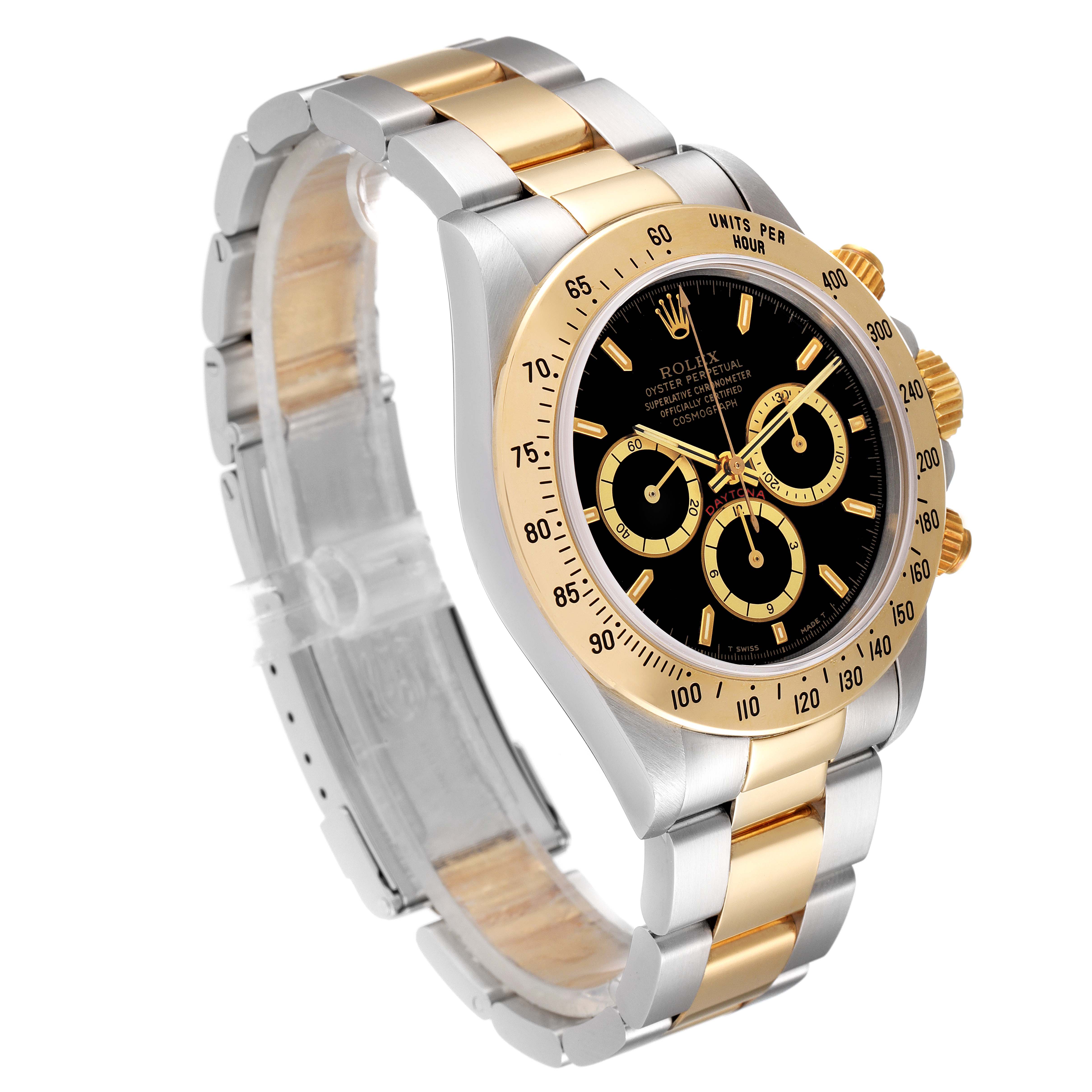 This image shows a side angle of a Rolex Daytona 16523 Men
s Steel and Gold (two tone) Black Dial 16523 Men
s Steel and Gold (two tone) Black Dial with a gold bezel, black dial, and two-tone bracelet.