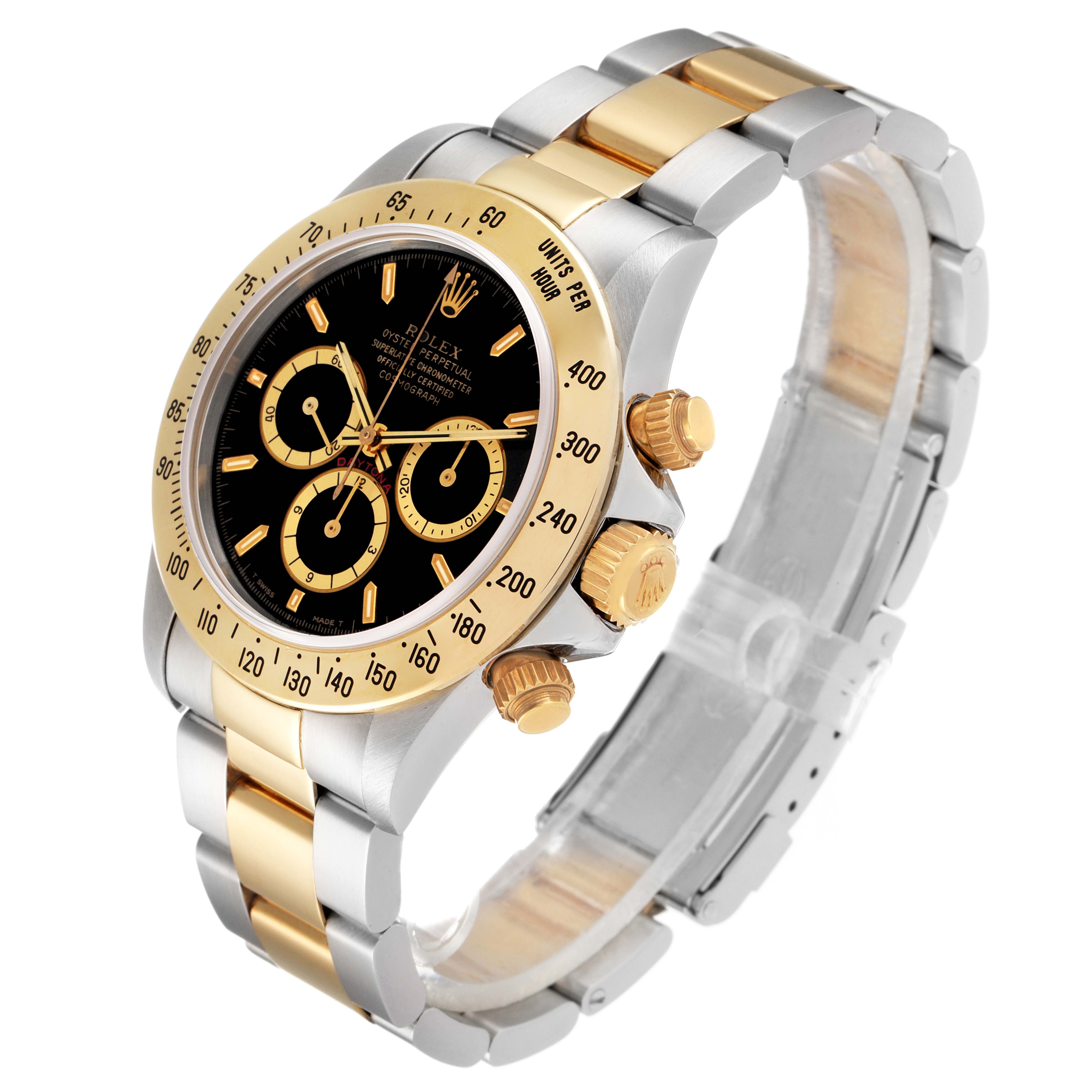 The Rolex Daytona 16523 Men
s Steel and Gold (two tone) Black Dial 16523 Men
s Steel and Gold (two tone) Black Dial model watch is shown at a slight right angle, displaying the dial, bezel, crown, and strap.