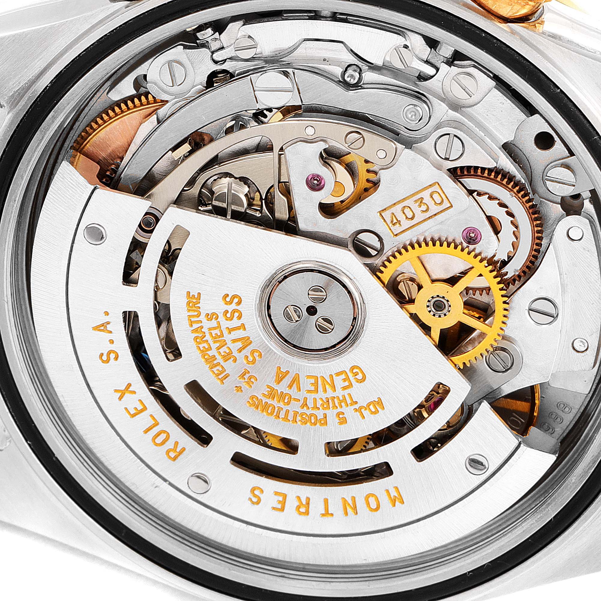 This image shows the intricate internal mechanism of the Rolex Daytona 16523 Men
s Steel and Gold (two tone) Black Dial 16523 Men
s Steel and Gold (two tone) Black Dial watch, viewed from the back case.