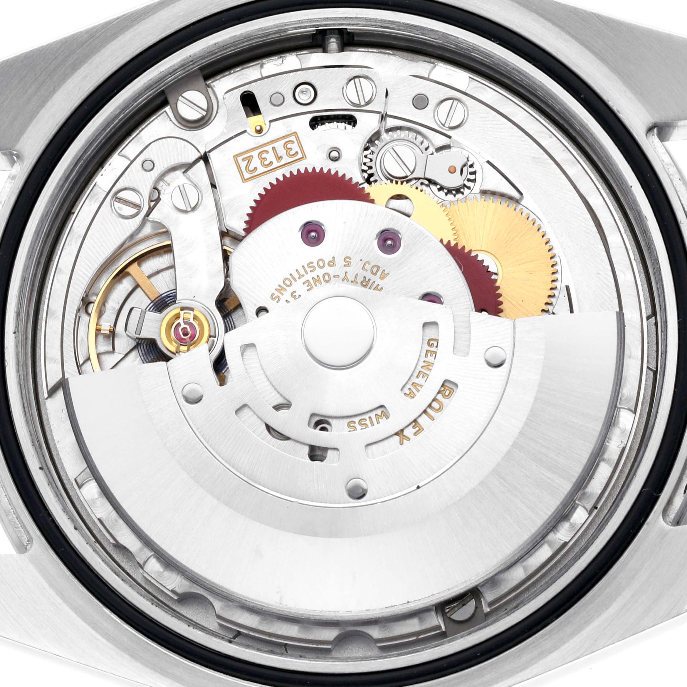 The image shows the inner mechanical movement of a Rolex Explorer 214270 Men's Stainless Steel Black Dial 214270 Men's Stainless Steel Black Dial watch from a top-down angle, highlighting gears and components.