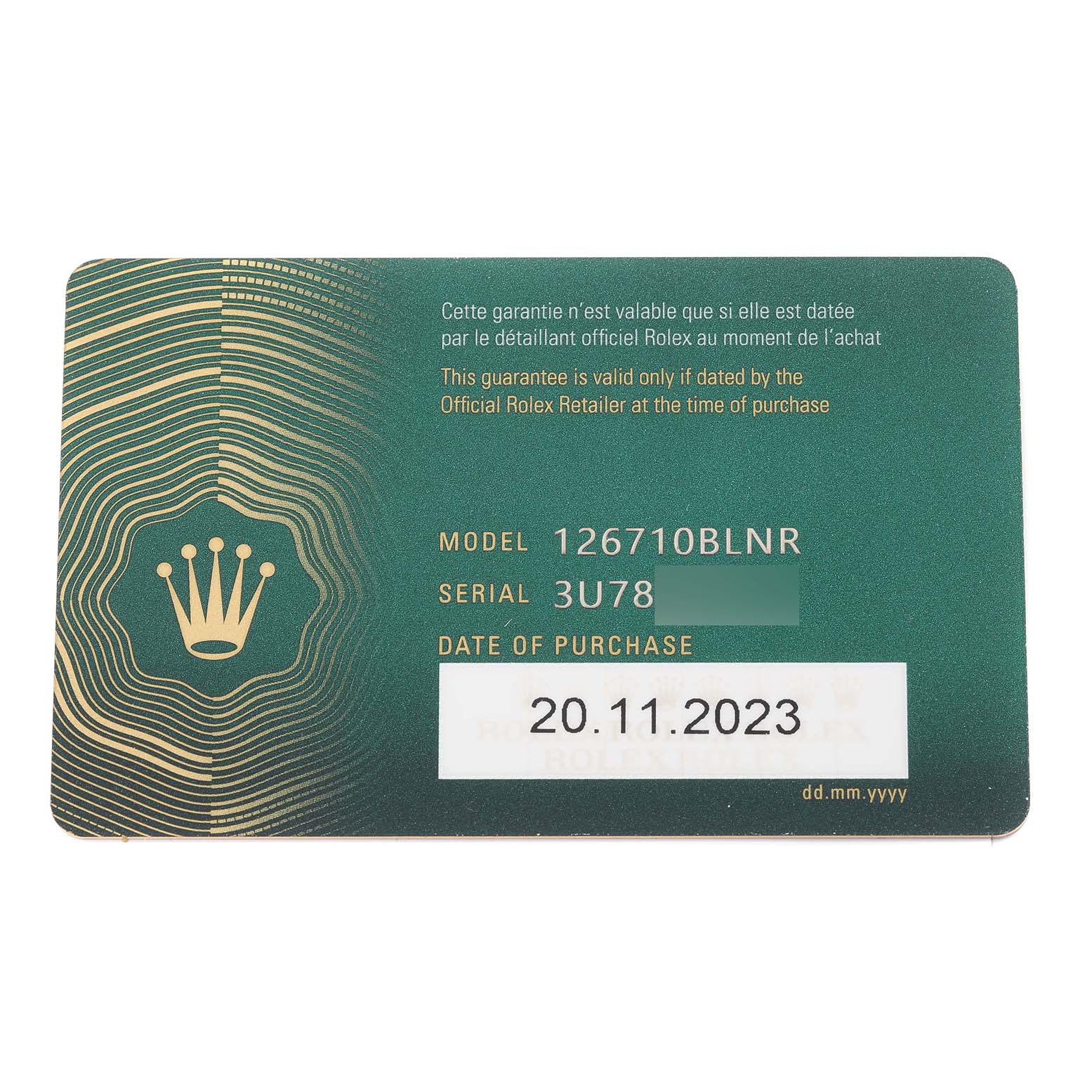 The image shows a guarantee card for a Rolex GMT-Master 126710BLNR Men
s Stainless Steel Black Dial 126710BLNR Men
s Stainless Steel Black Dial model 126710BLNR, displaying the model, serial number, and date of purchase.