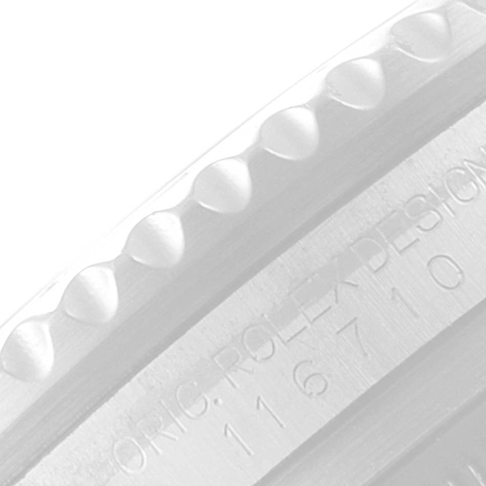 This close-up image shows the engraved side of the bezel and case of the Rolex GMT-Master 116710 Men
s Stainless Steel Black Dial 116710 Men
s Stainless Steel Black Dial watch.