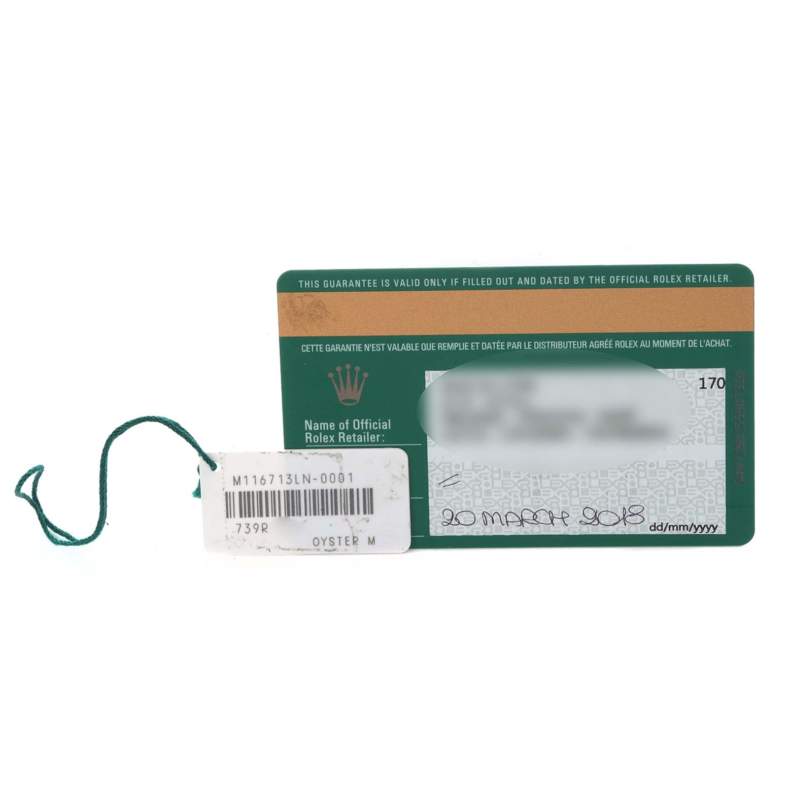 The image shows a guarantee card and tag for a Rolex GMT-Master 116713LN Men's Steel and Gold (two tone) Black Dial 116713LN Men's Steel and Gold (two tone) Black Dial, viewed from above.