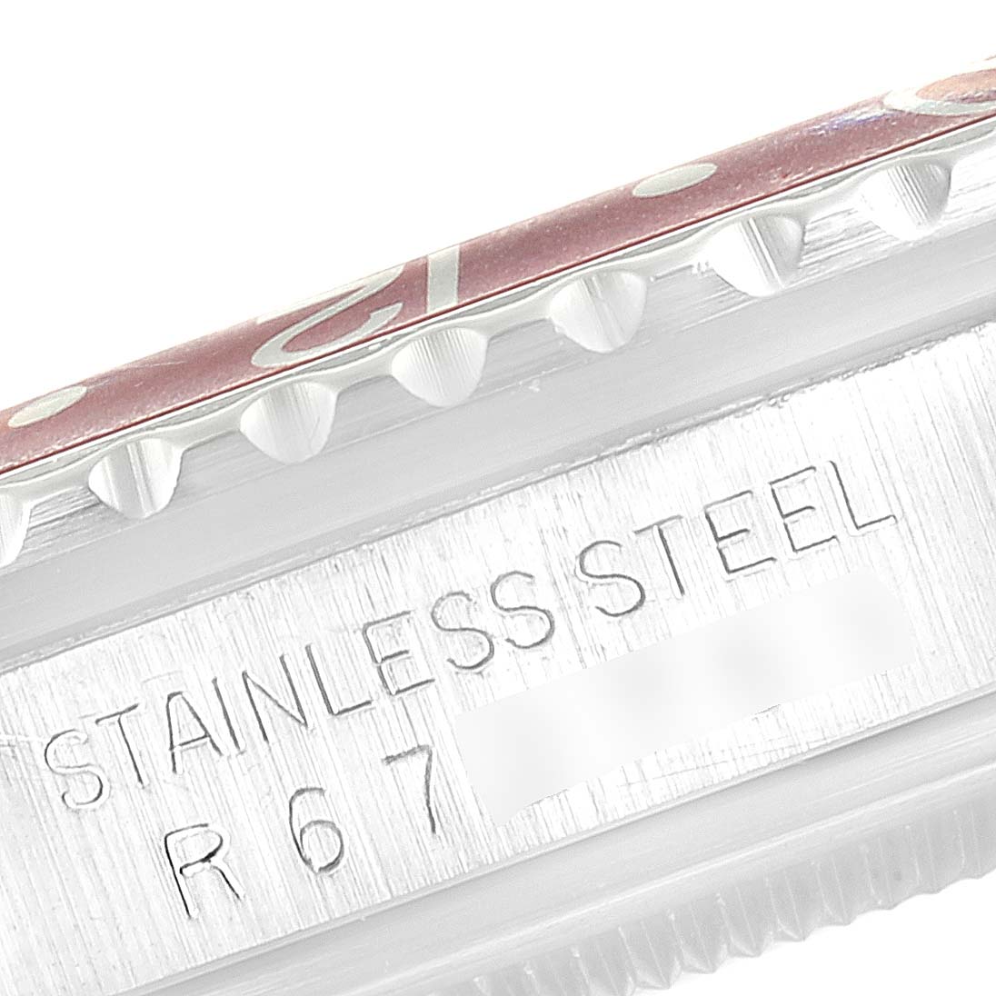 The image shows a close-up of the bezel and casing of a Rolex Vintage Collection 16750 Men's Stainless Steel Black Dial 16750 Men's Stainless Steel Black Dial watch.