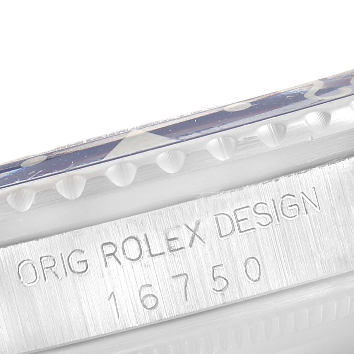 This image shows a close-up angle of the case side of a Vintage Collection Rolex watch, highlighting the model number 16750.