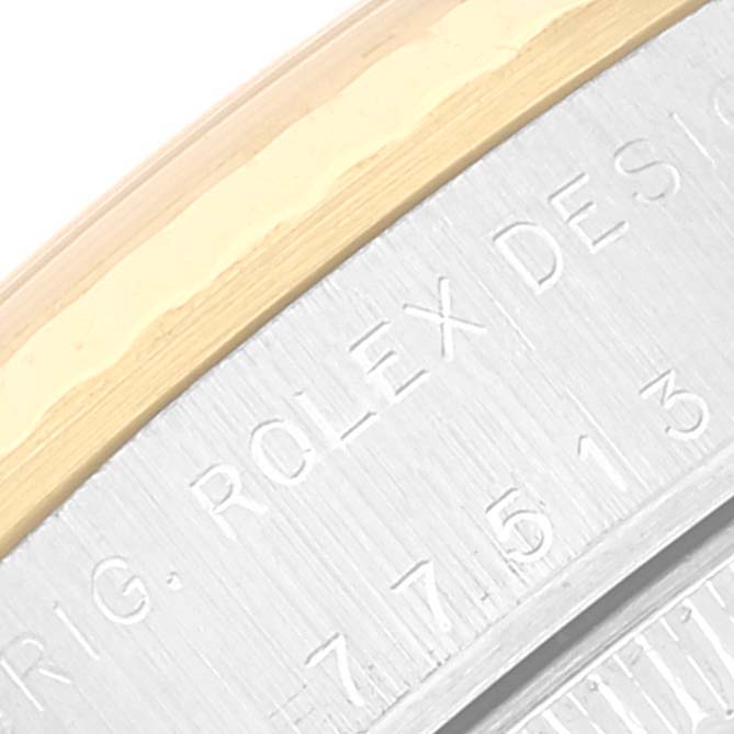 This is a close-up of the case back of a Mid-Size Rolex watch showing the engraved "ROLEX DESIGN" text.