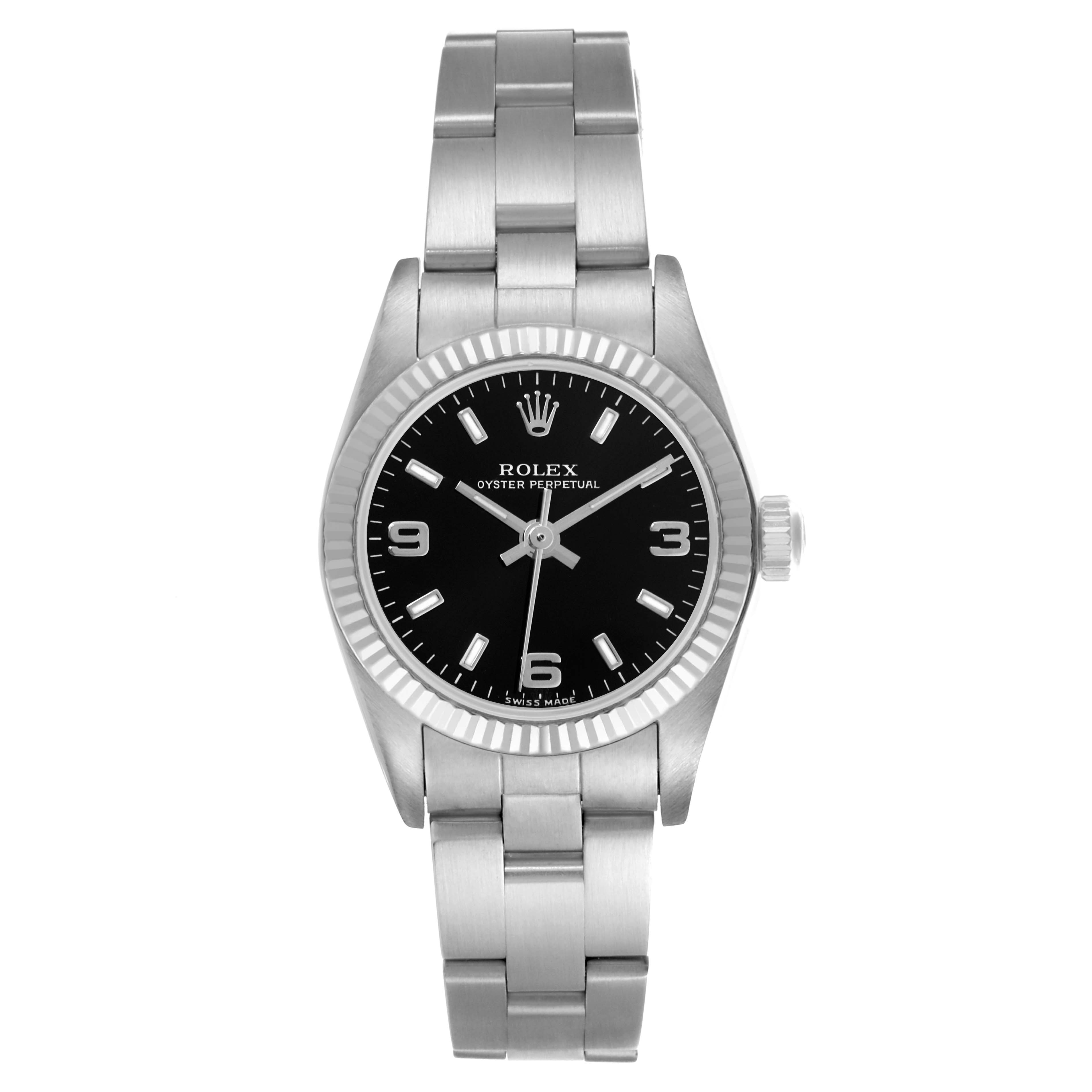 The Rolex Oyster Perpetual 76094 Women's Stainless Steel Black Dial 76094 Women's Stainless Steel Black Dial watch is shown from a front angle, displaying its dial, bezel, crown, and bracelet.
