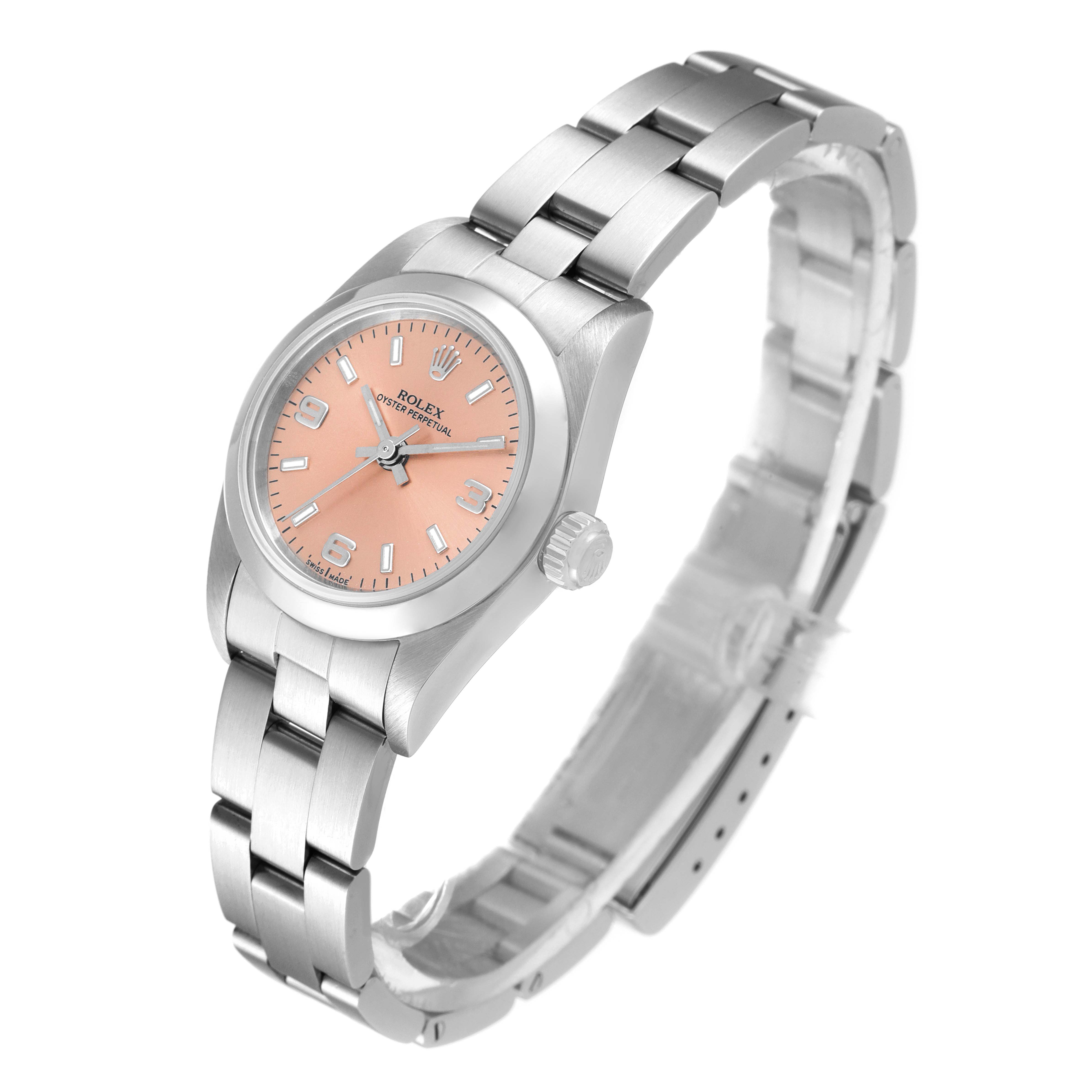 The image shows the front and side angle of a Rolex Oyster Perpetual 76080 Women
s Stainless Steel Pink Dial 76080 Women
s Stainless Steel Pink Dial watch, focusing on its face, bracelet, and crown.