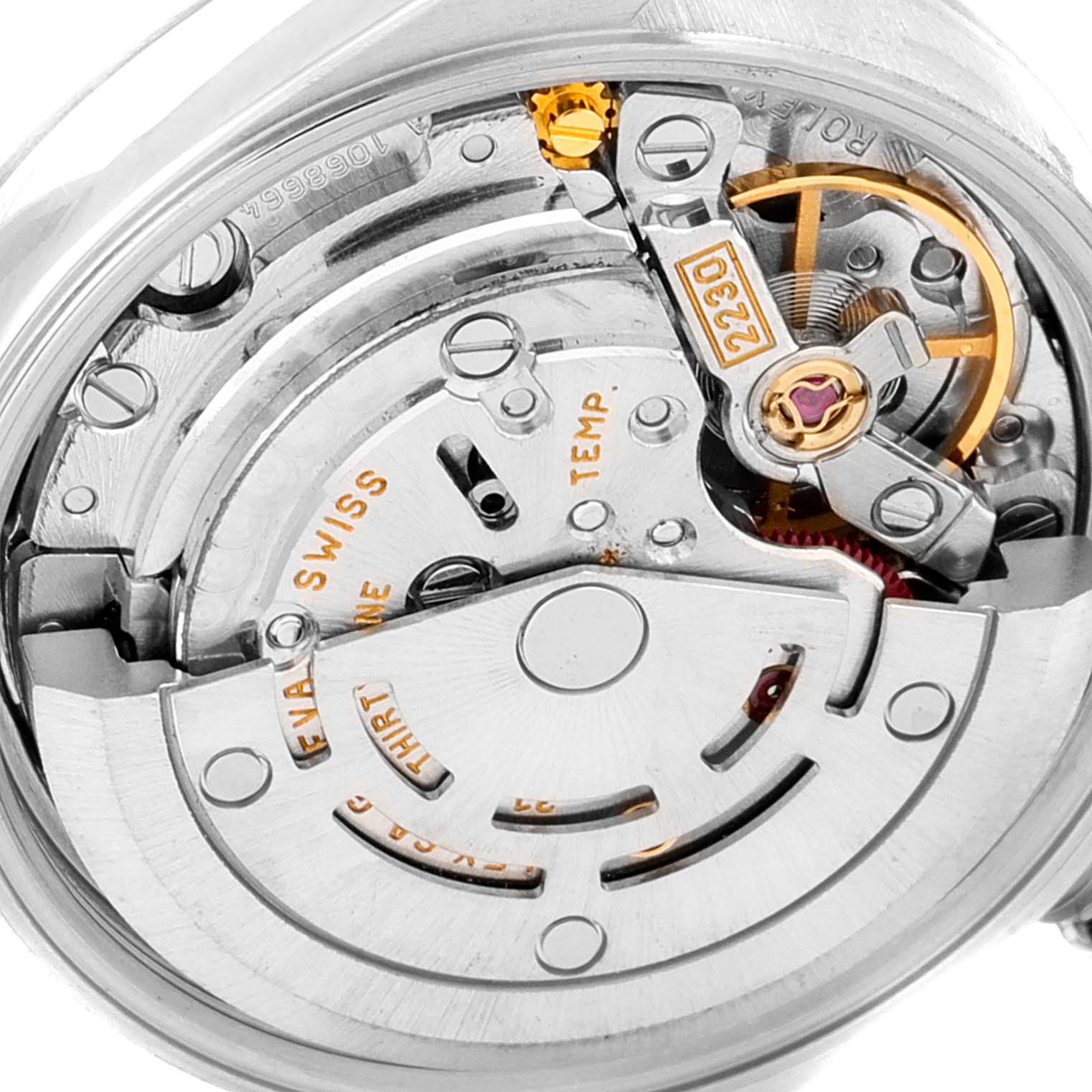 This image shows the intricate inner movement mechanism of a Rolex Oyster Perpetual 76080 Women
s Stainless Steel Pink Dial 76080 Women
s Stainless Steel Pink Dial watch, emphasizing its Swiss craftsmanship.