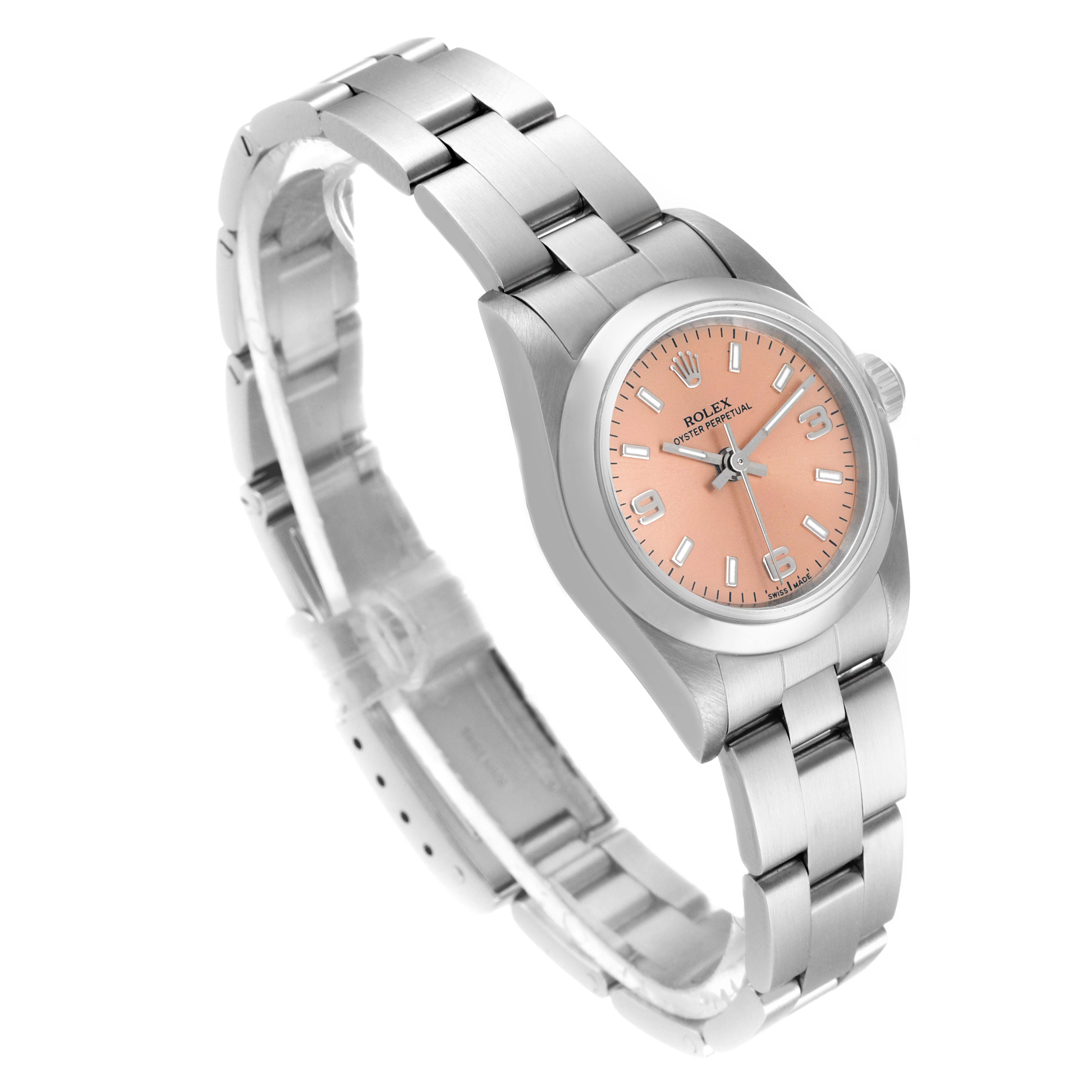 The image shows a Rolex Oyster Perpetual 76080 Women
s Stainless Steel Pink Dial 76080 Women
s Stainless Steel Pink Dial watch with a pink dial, viewed from an angled perspective highlighting the face and bracelet.