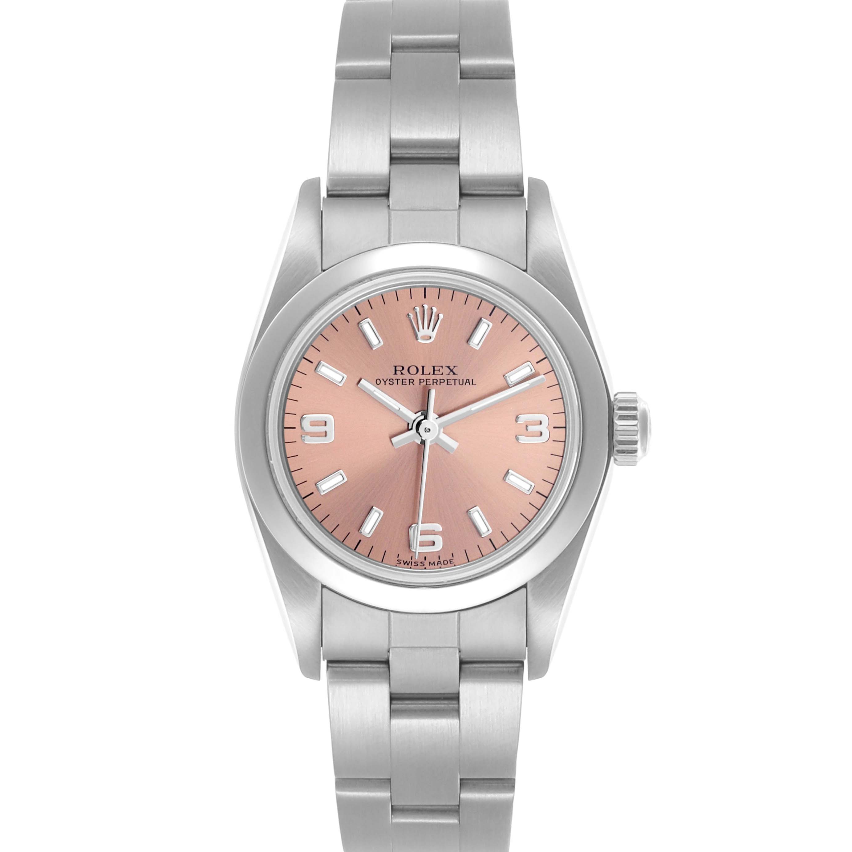 The Rolex Oyster Perpetual 76080 Women's Stainless Steel Pink Dial 76080 Women's Stainless Steel Pink Dial watch is shown from a front angle, displaying its face, bezel, and bracelet.