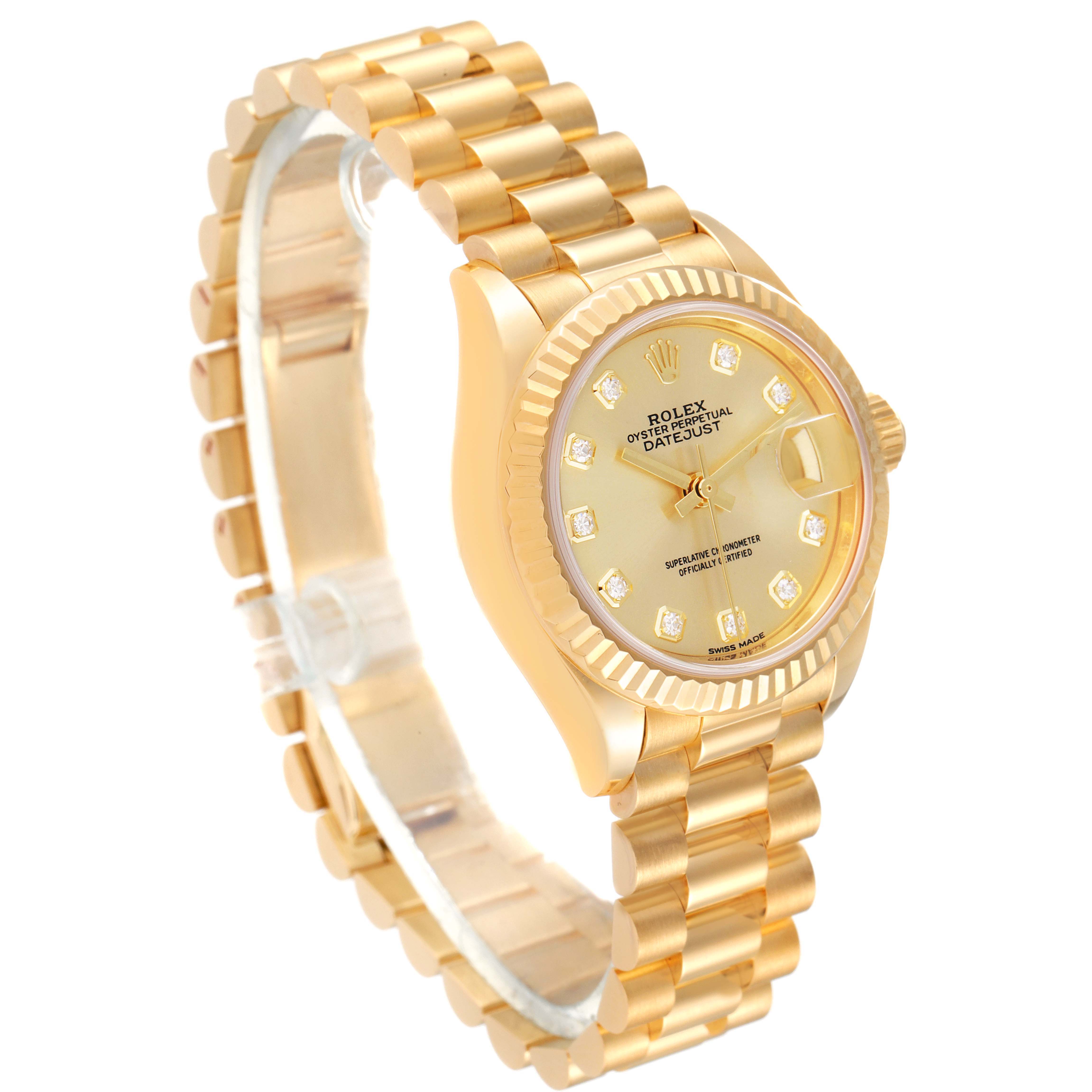 The Rolex President 279178 Women
s Yellow Gold Champagne Dial 279178 Women
s Yellow Gold Champagne Dial watch is shown at an angled view, highlighting its gold band, case, and dial with diamond hour markers.