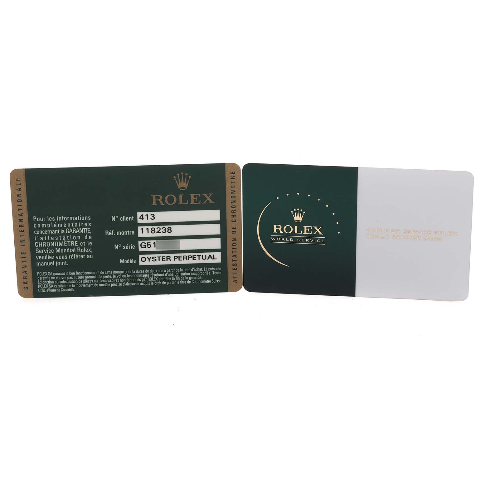 The image shows warranty cards for the Rolex President 118238 Men
s Yellow Gold Green Dial 118238 Men
s Yellow Gold Green Dial model, angled towards the viewer.
