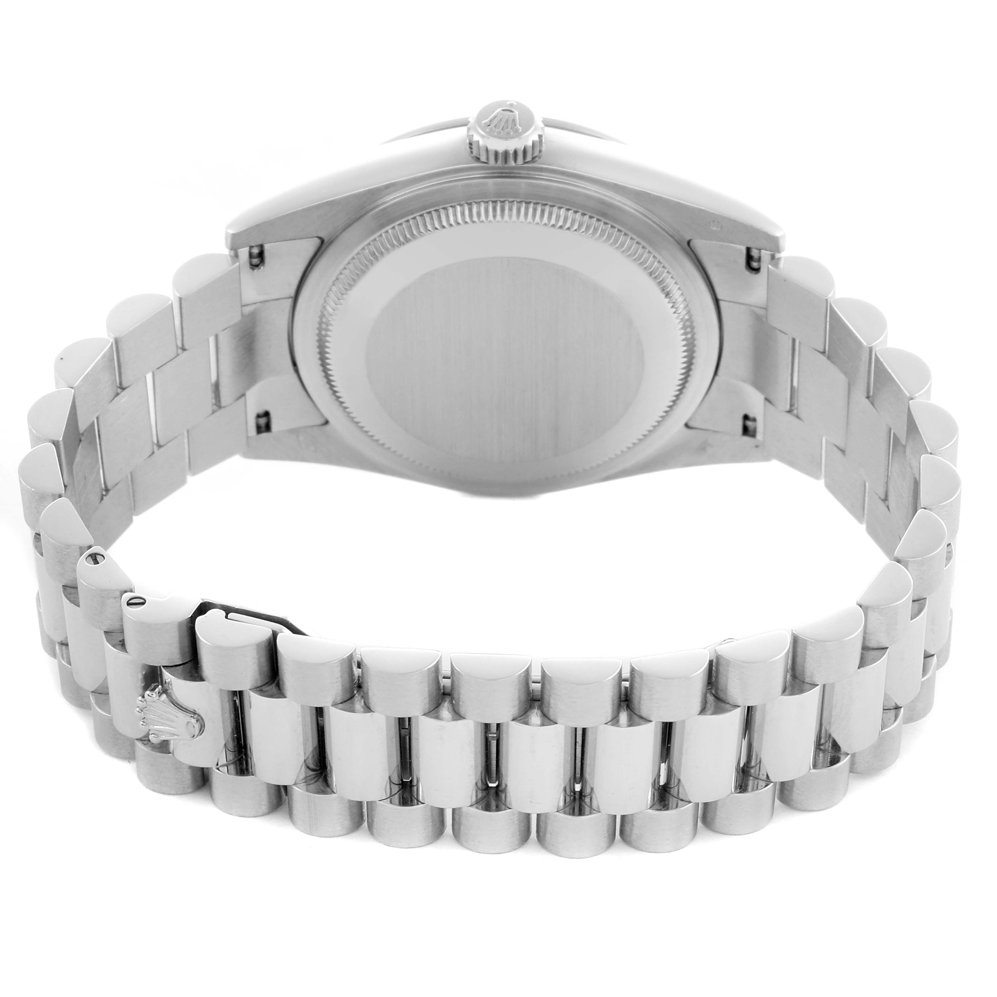 The image shows the back view of a Rolex President 118296 Men
s Platinum Blue Dial 118296 Men
s Platinum Blue Dial watch, highlighting the case back and bracelet.