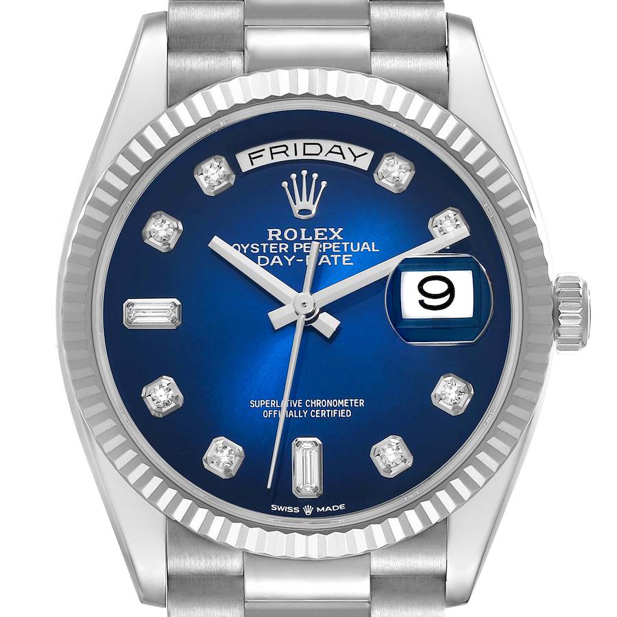 The image shows a frontal view of the Rolex President model, highlighting the blue dial, day-date indicators, and bezel details.