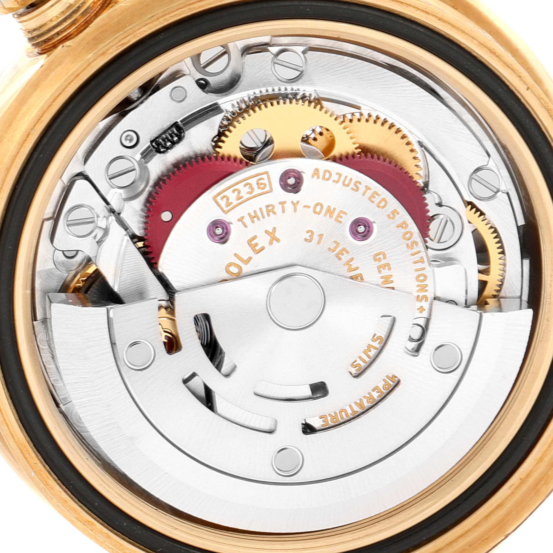 The image shows a close-up of the Rolex President 279138 Women's Yellow Gold Silver Dial 279138 Women's Yellow Gold Silver Dial model watch's movement, highlighting its intricate internal mechanisms and gears.