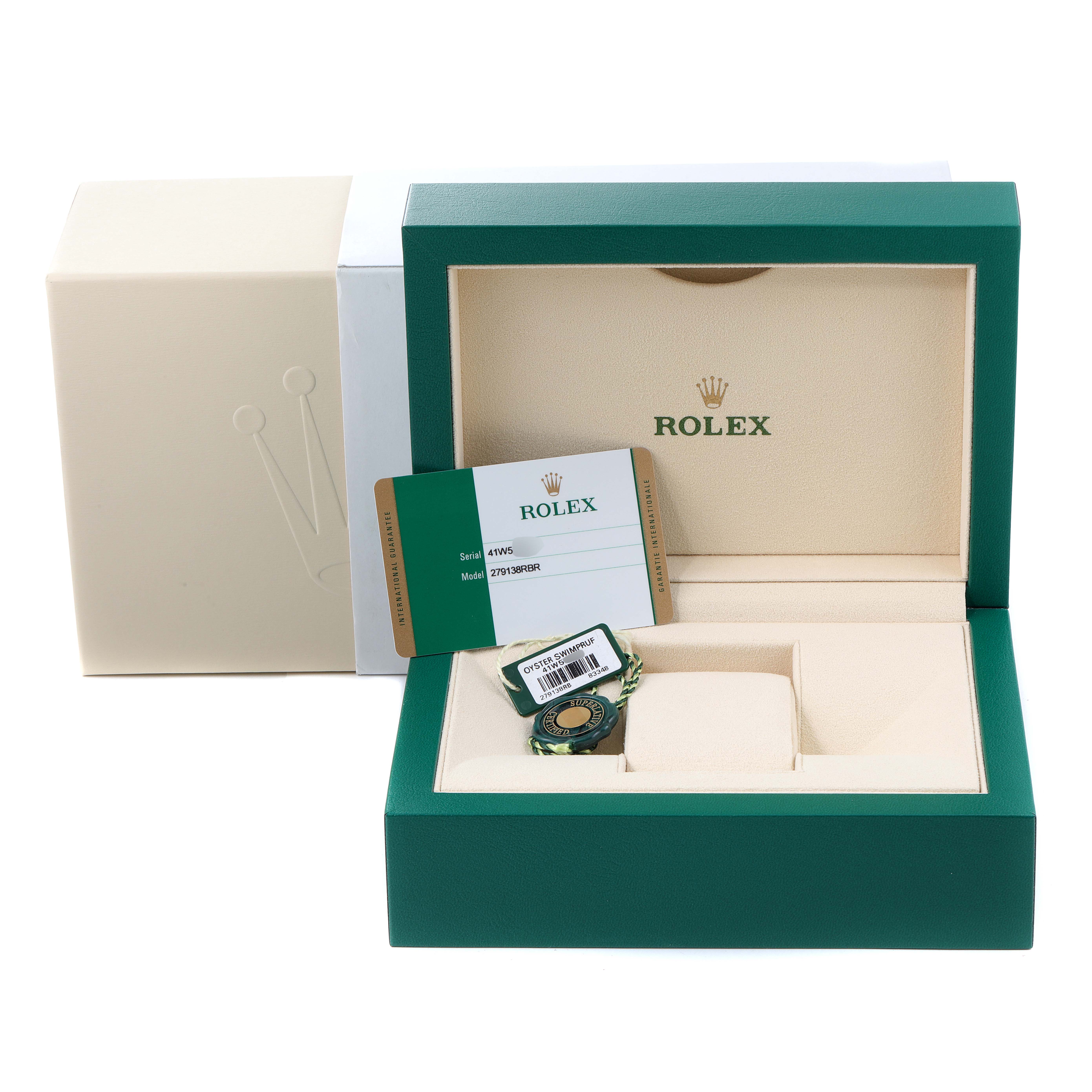 The image shows an open Rolex President 279138 Women's Yellow Gold Silver Dial 279138 Women's Yellow Gold Silver Dial model watch box with certification and a tag inside, viewed from the front.